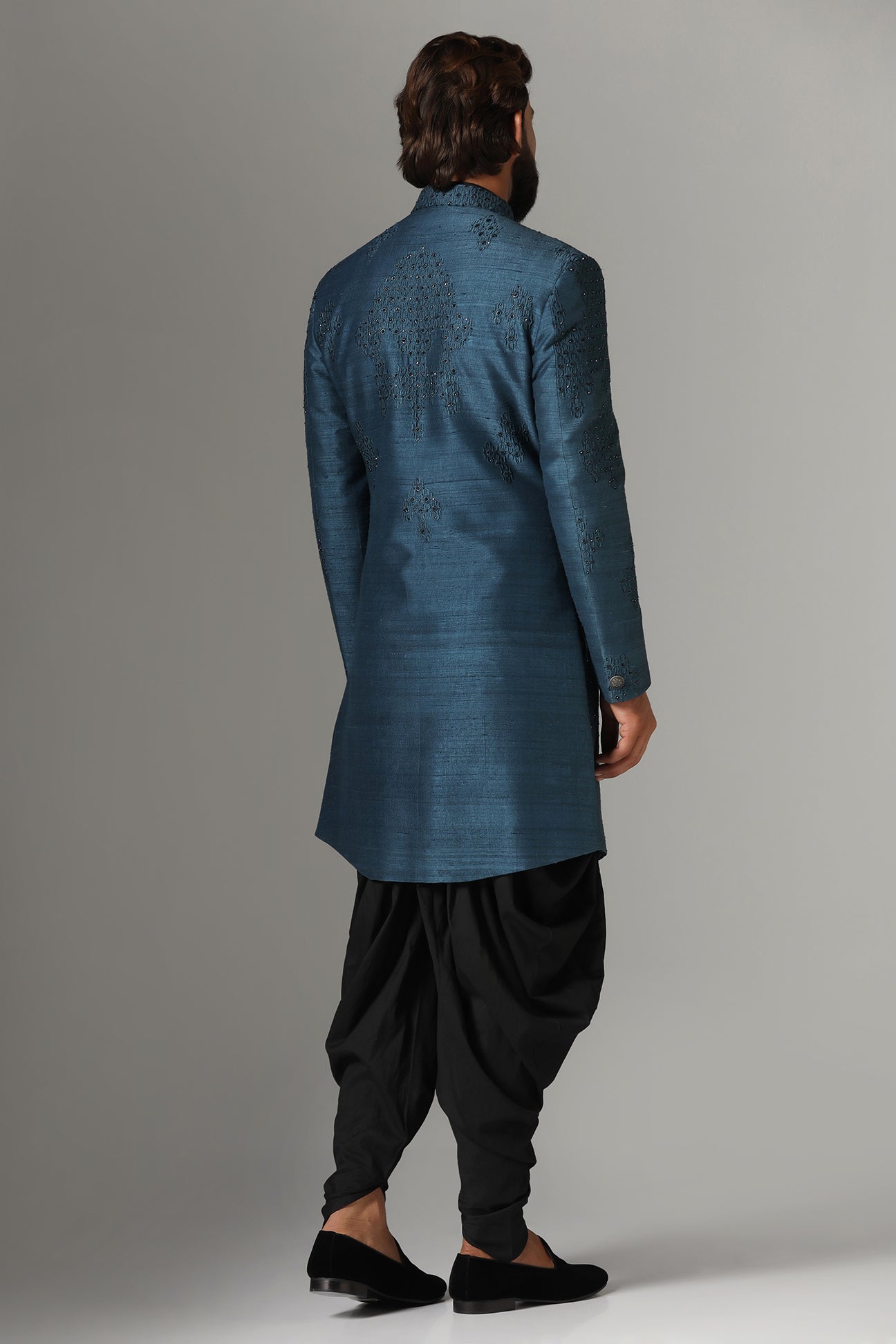 This Blue Indowestern is highlighted with tonal embroidery all across the garment. Shop Now!