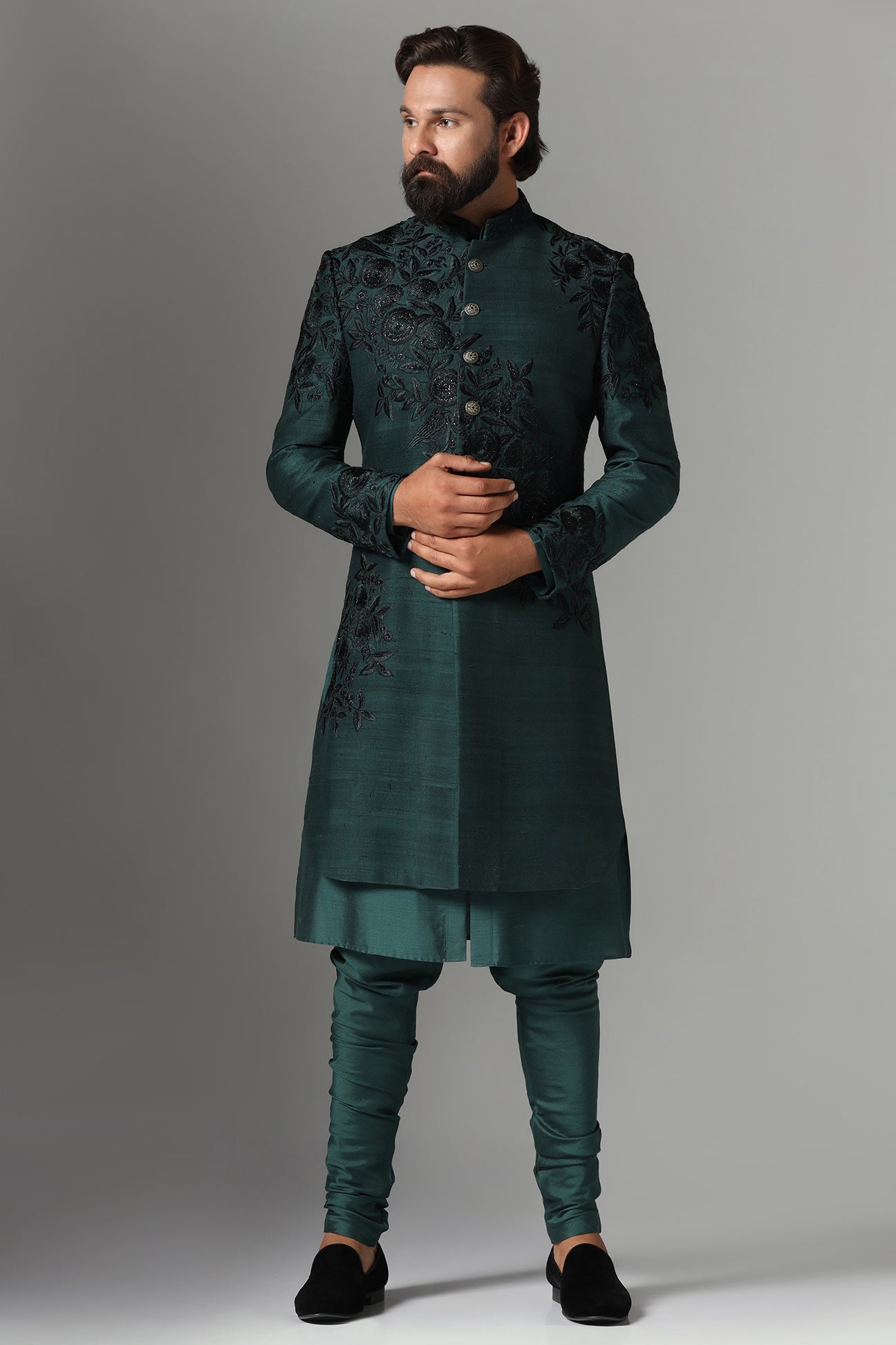 This green Indo-Western features tonal embroidery on the garment. Shop Now!