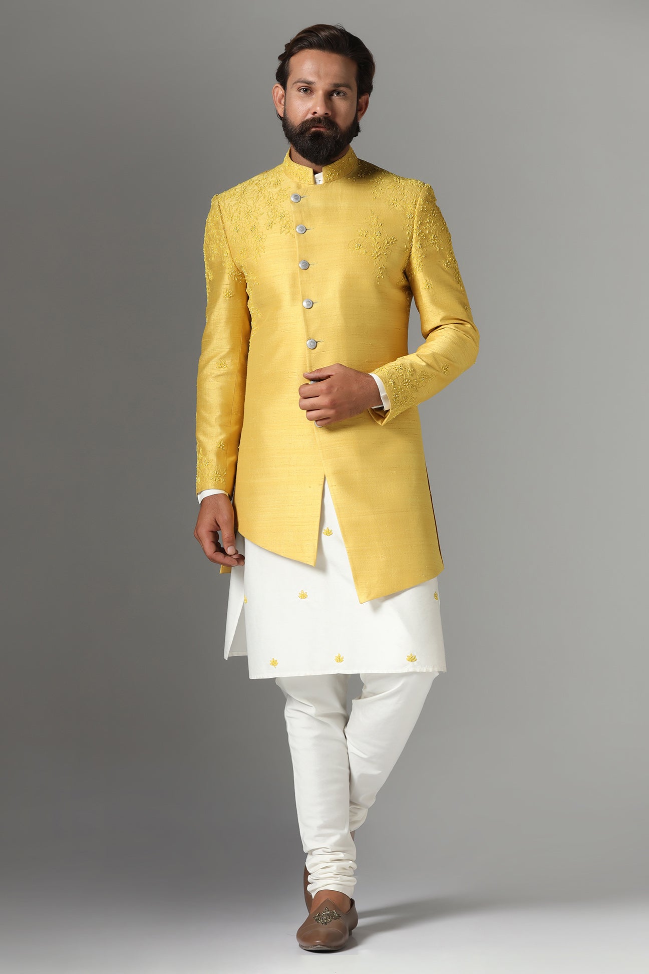 This Yellow Indo-western features subtle embroidery on the garment. Shop Now!