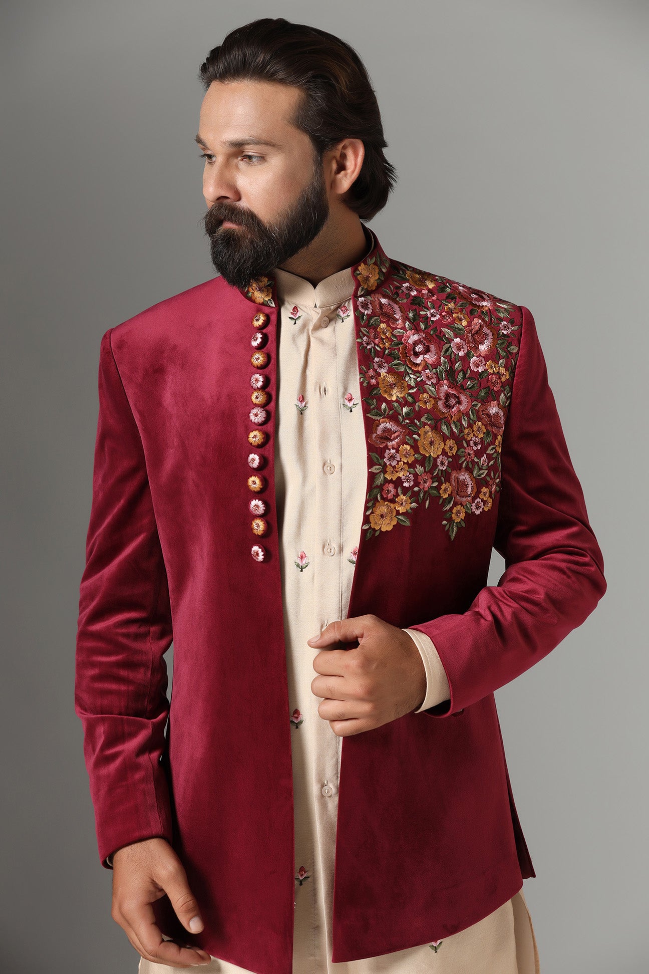This Indo-Western features multi-coloured floral embroidery on the collar and left panel. Shop Now!