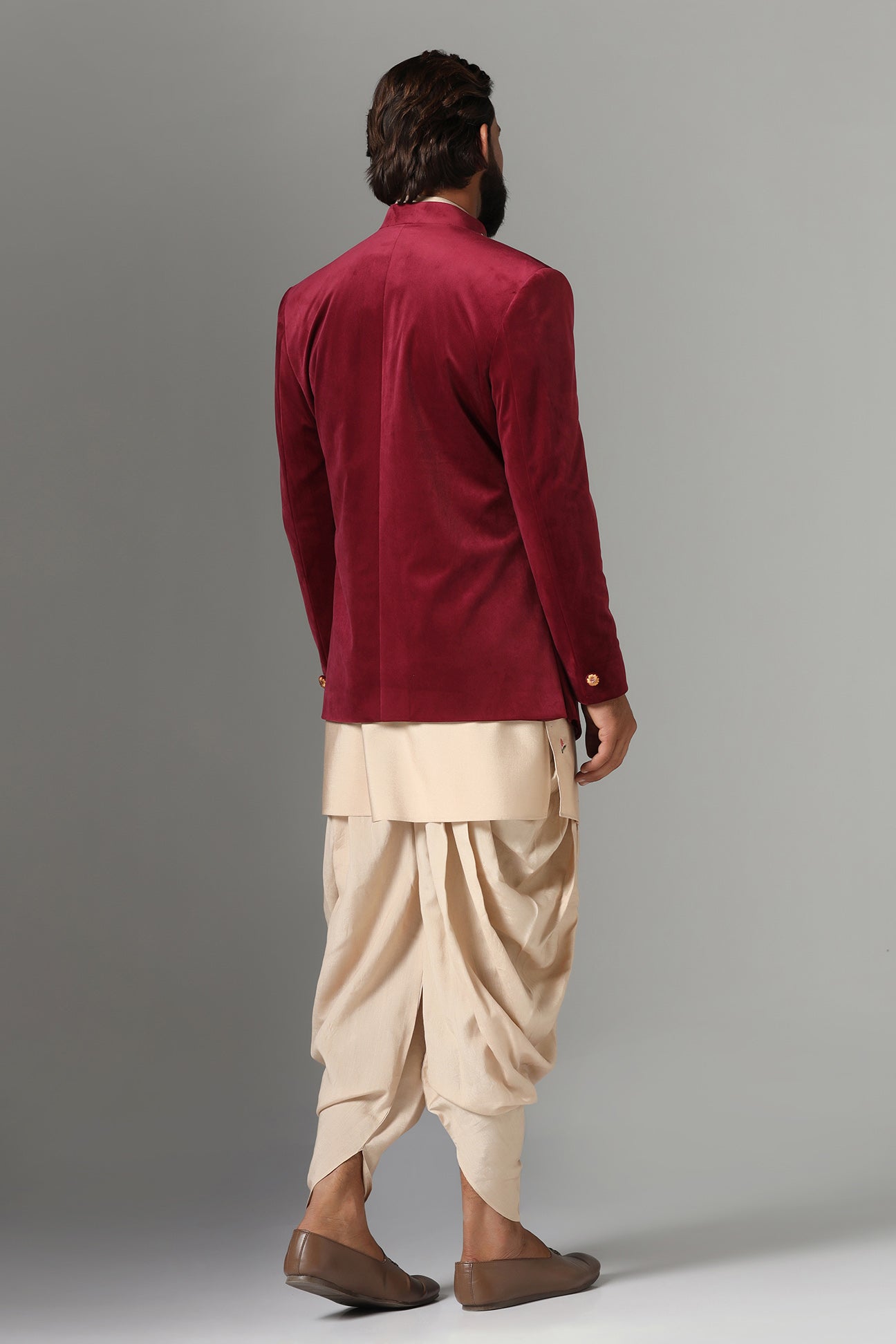 This Indo-Western features multi-coloured floral embroidery on the collar and left panel. Shop Now!