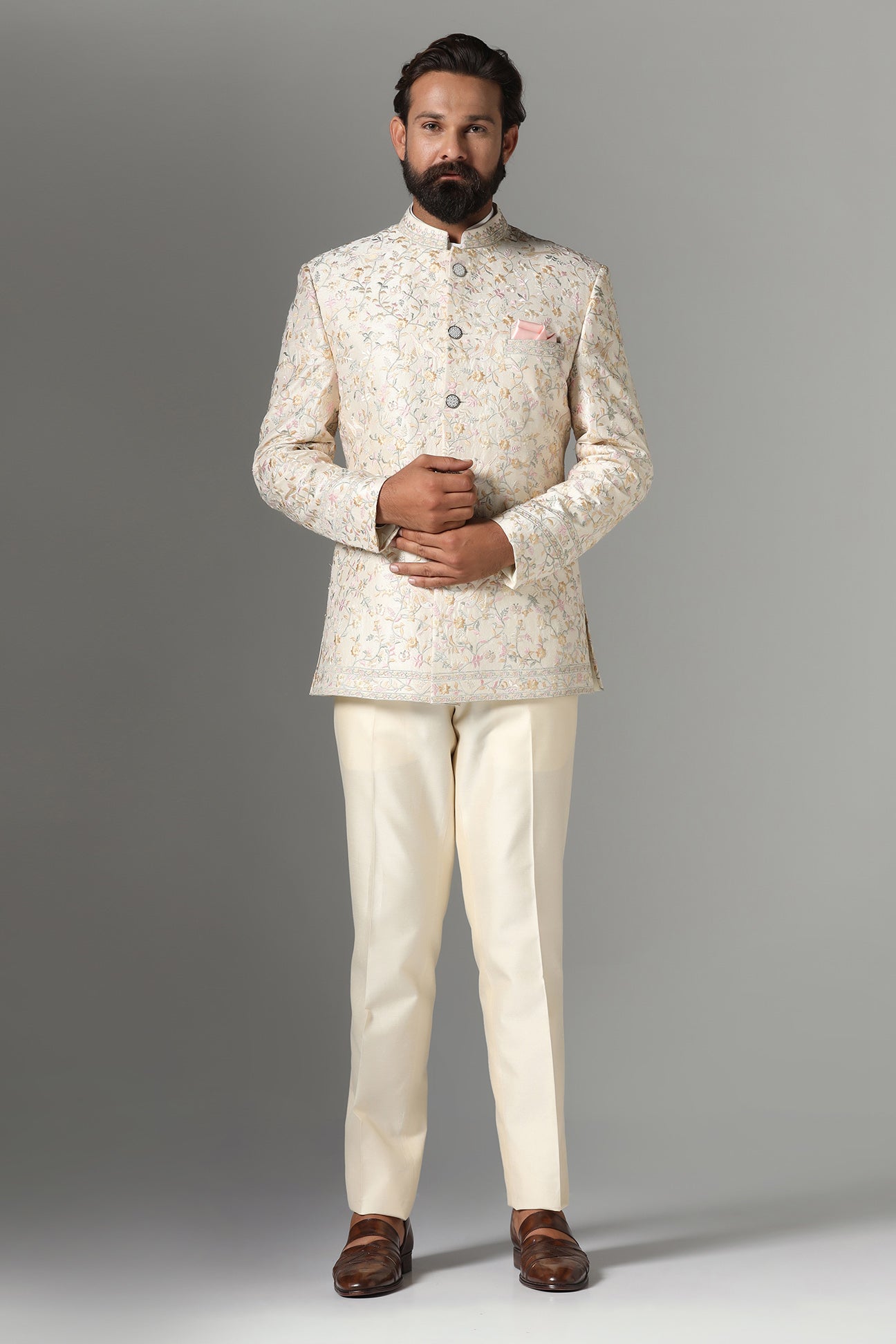 Unveil timeless elegance with the Off-White Embroidered Bandhgala Suit from Brahaan Store. Shop now!