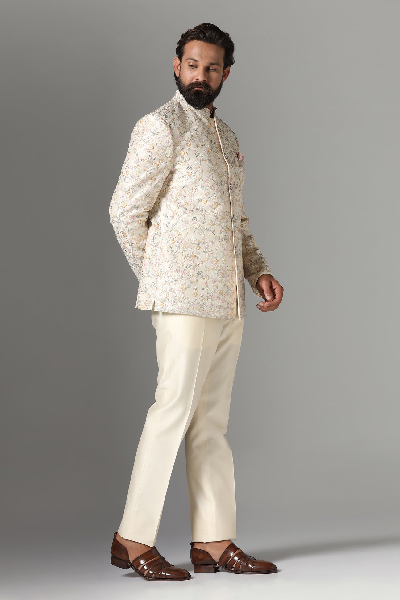 Unveil timeless elegance with the Off-White Embroidered Bandhgala Suit from Brahaan Store. Shop now!