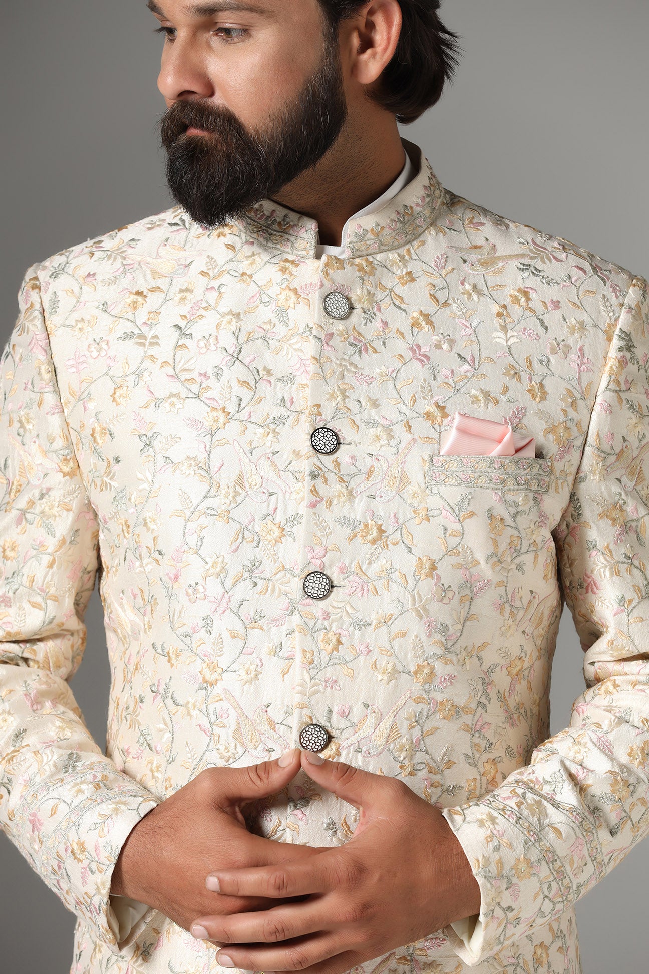 Unveil timeless elegance with the Off-White Embroidered Bandhgala Suit from Brahaan Store. Shop now!