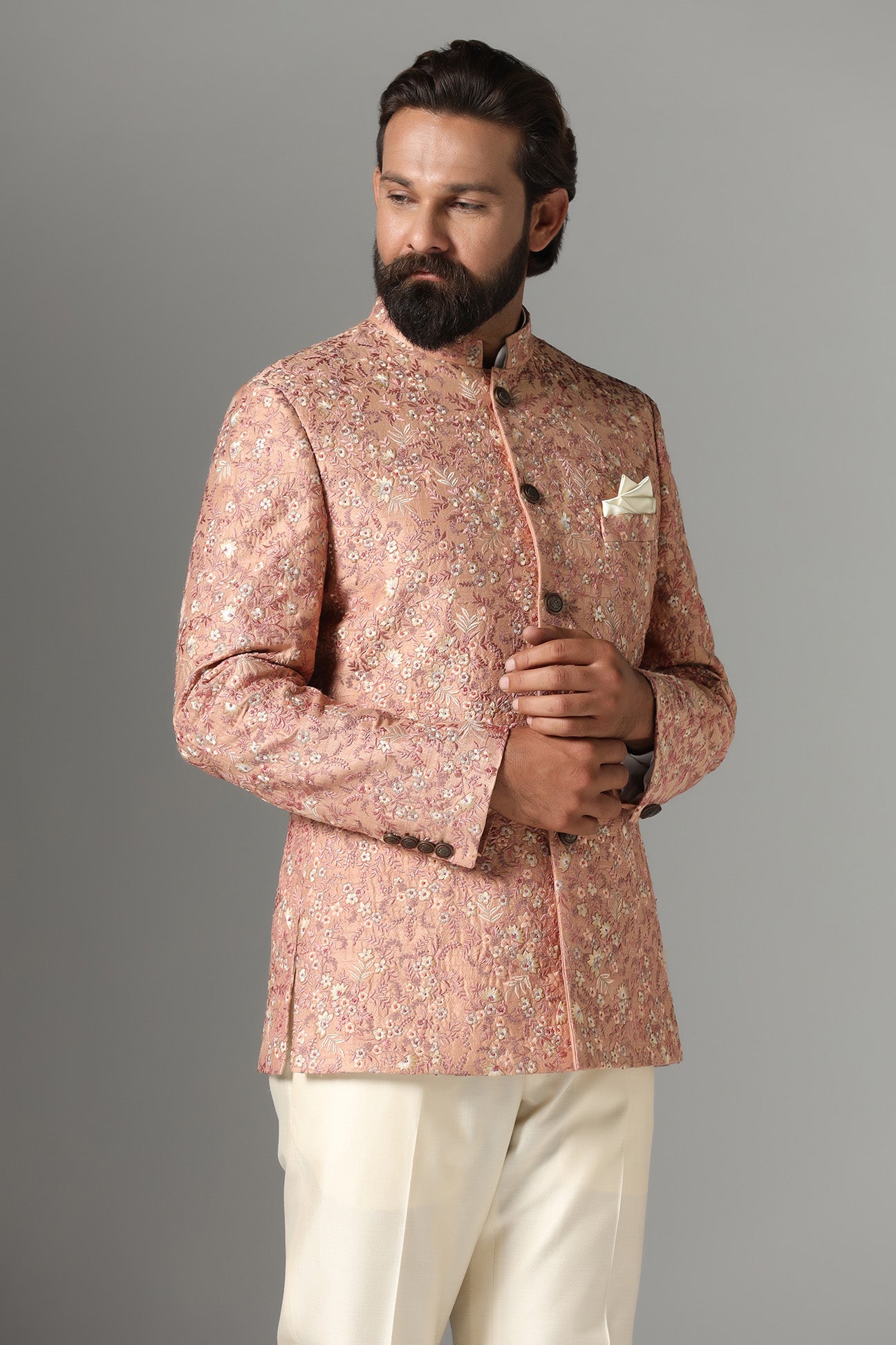 Step into elegance with the Light Orange Embroidered Bandhgala Suit from Brahaan Store. Shop Now!