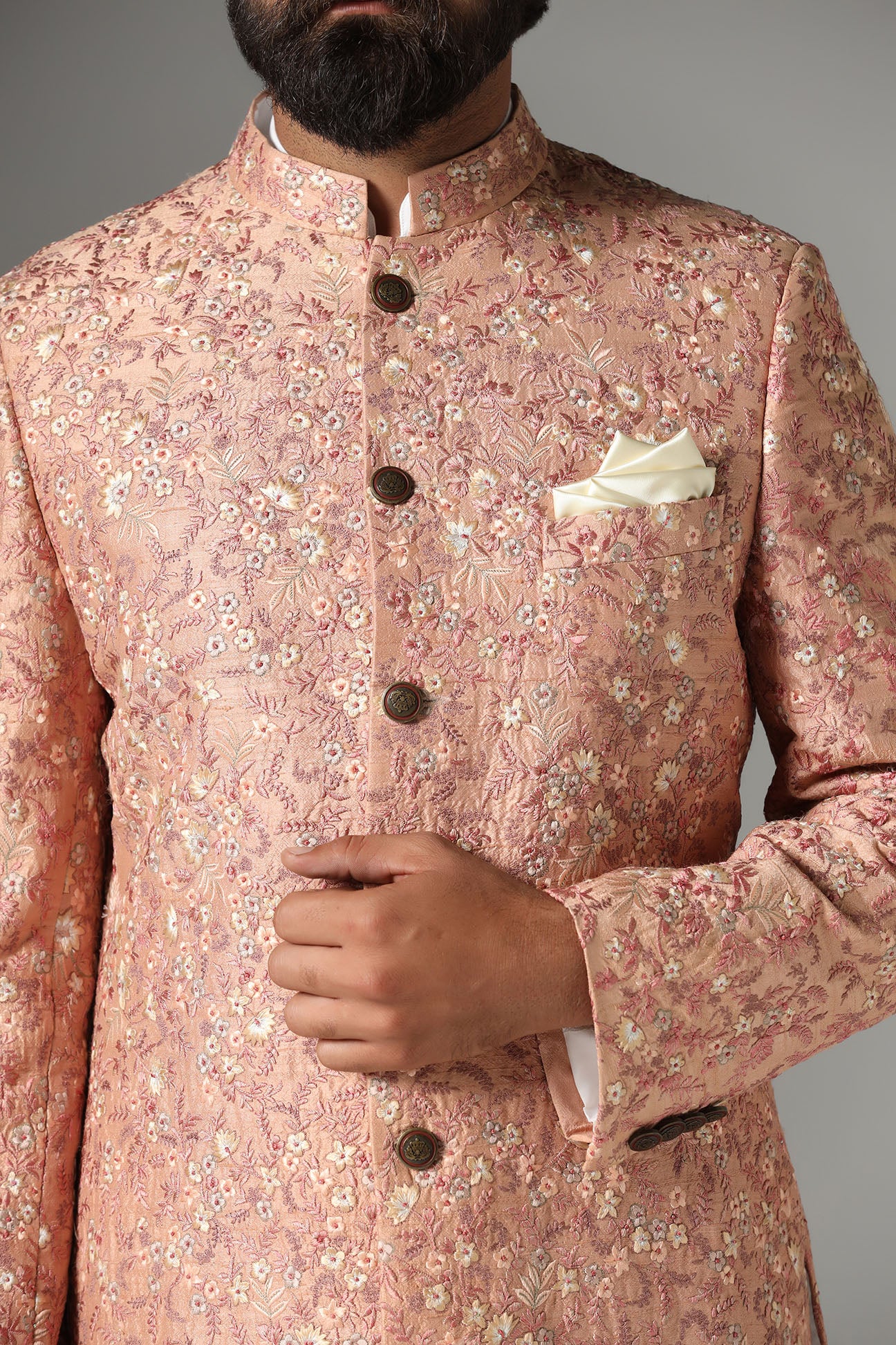 Step into elegance with the Light Orange Embroidered Bandhgala Suit from Brahaan Store. Shop Now!