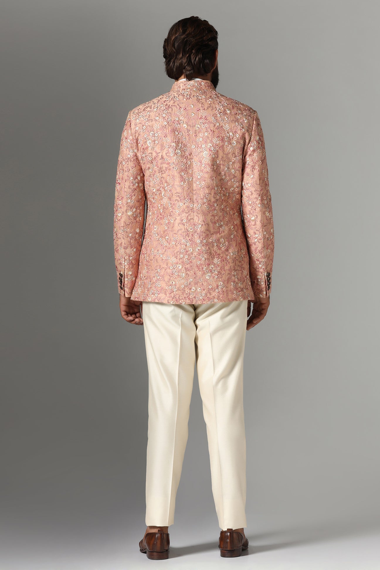 Step into elegance with the Light Orange Embroidered Bandhgala Suit from Brahaan Store. Shop Now!