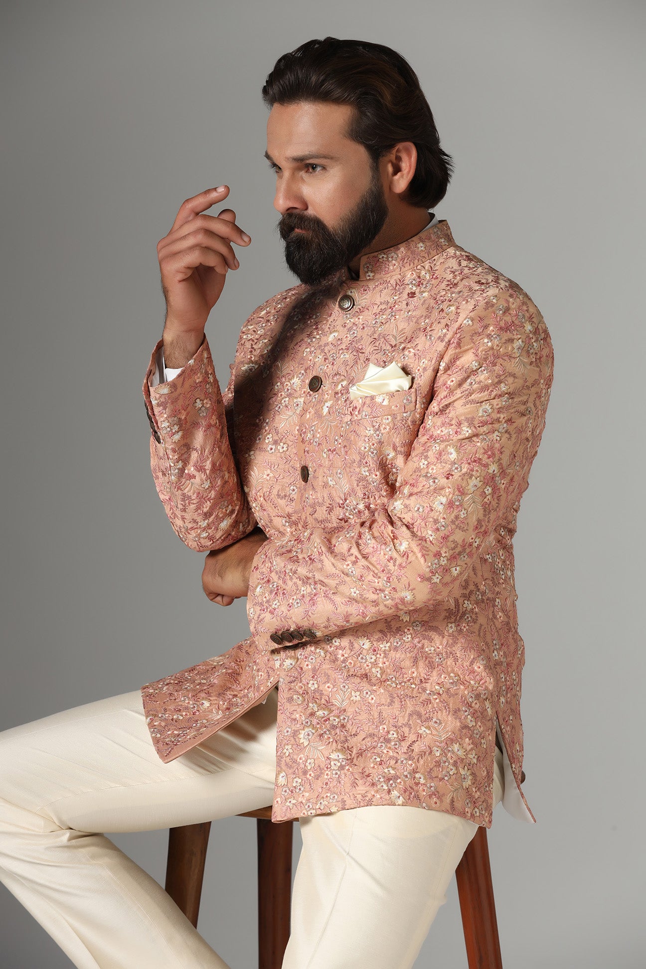 Step into elegance with the Light Orange Embroidered Bandhgala Suit from Brahaan Store. Shop Now!