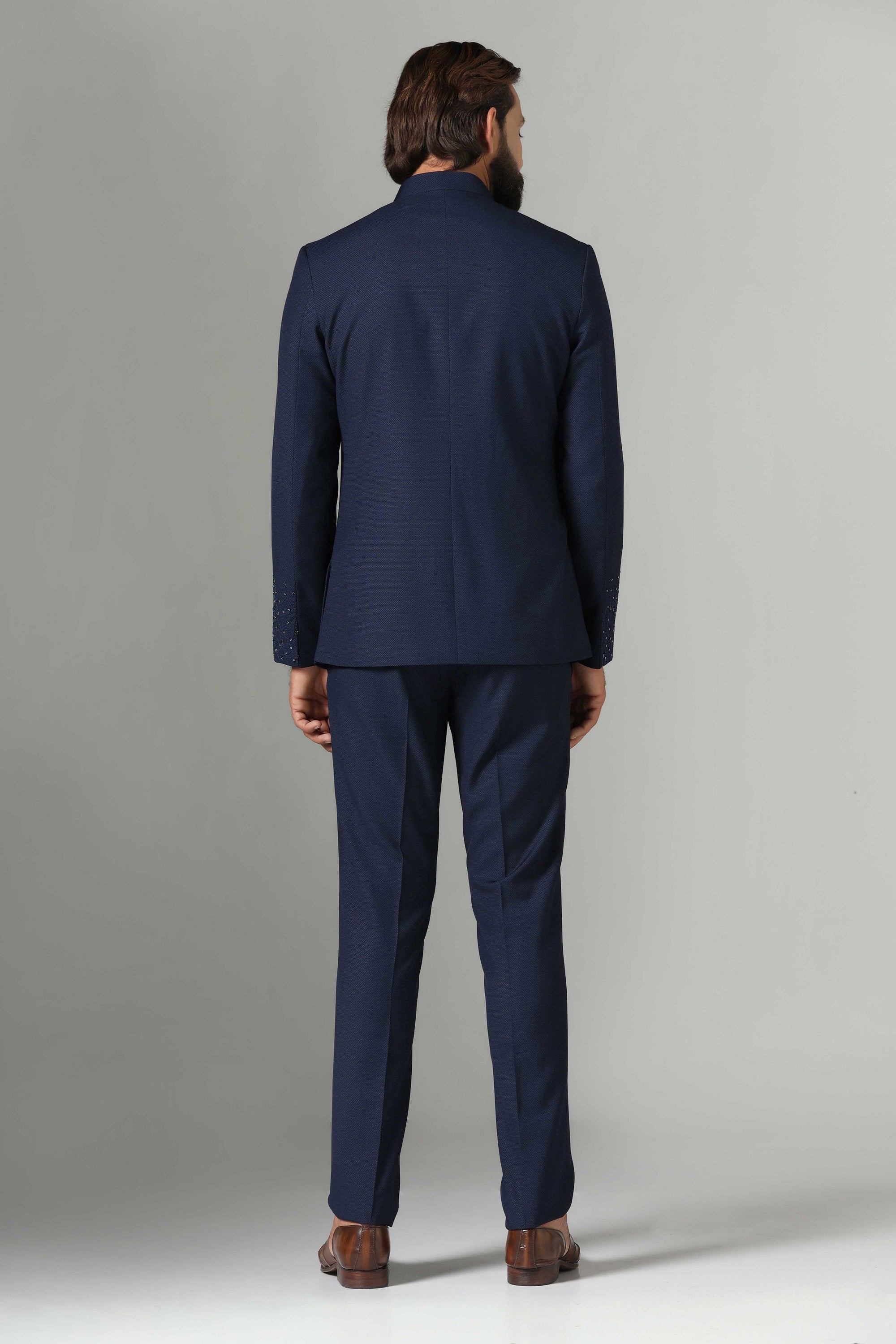Shop the stylish blue Bandhgala suit in navy blue for a classic and sophisticated look. Shop now!