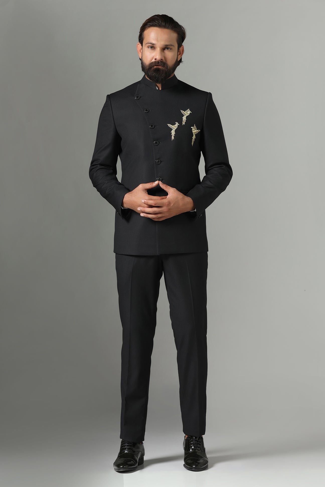 Asymmetric Black Bandhgala suit crafted from wool-rich fabric. Shop now!