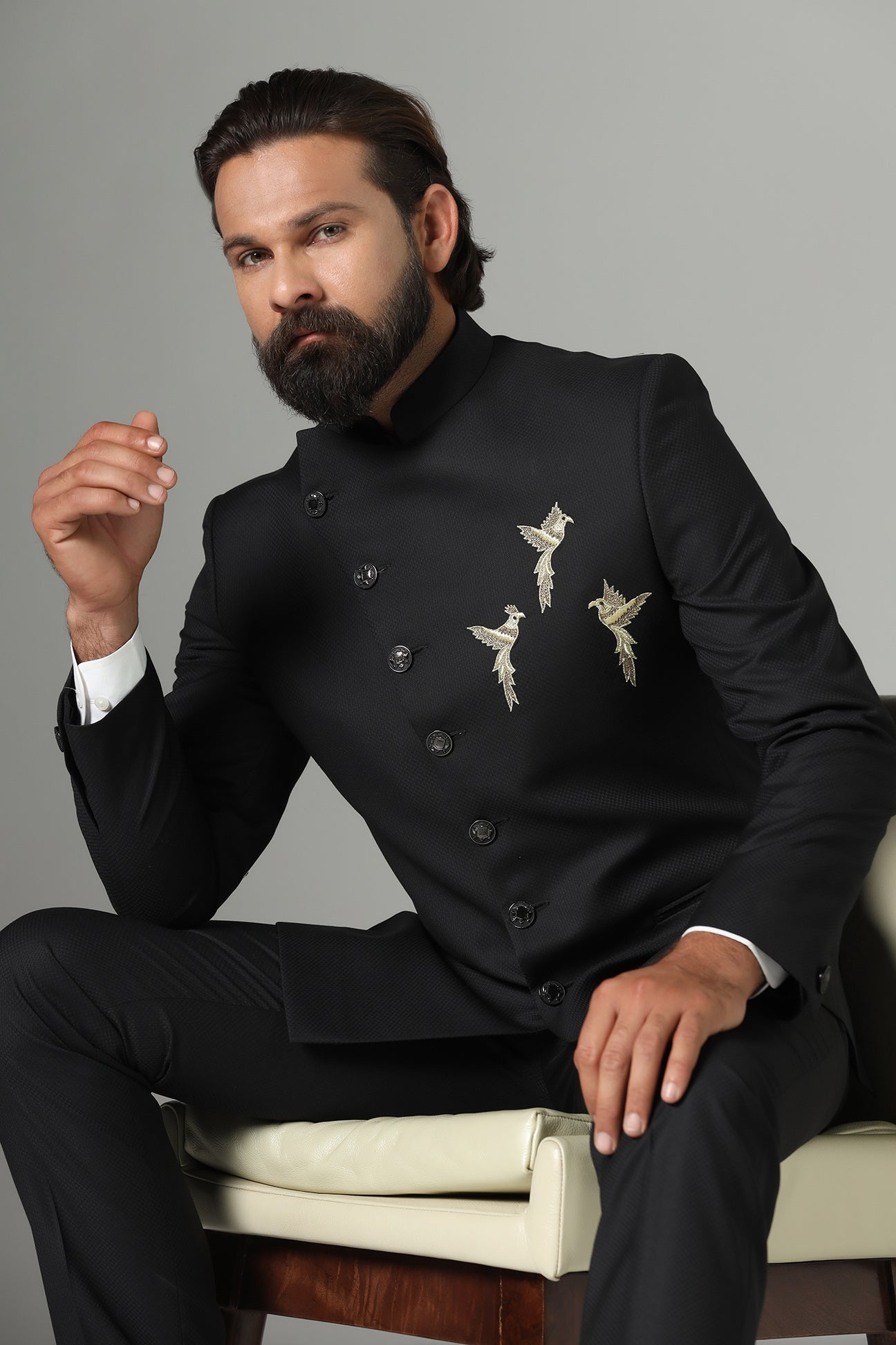 Asymmetric Black Bandhgala suit crafted from wool-rich fabric. Shop now!