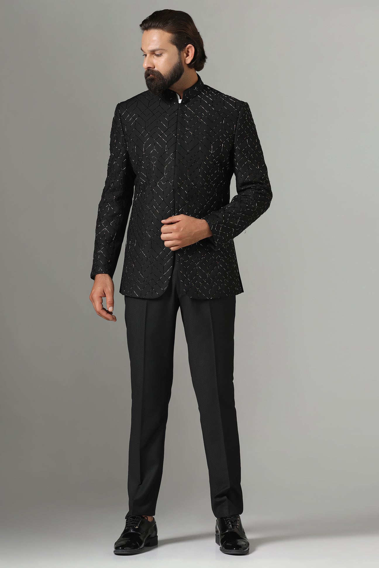 Shop the classic black Bandhgala suit with intricate embroidery for a sophisticated look. Shop now!