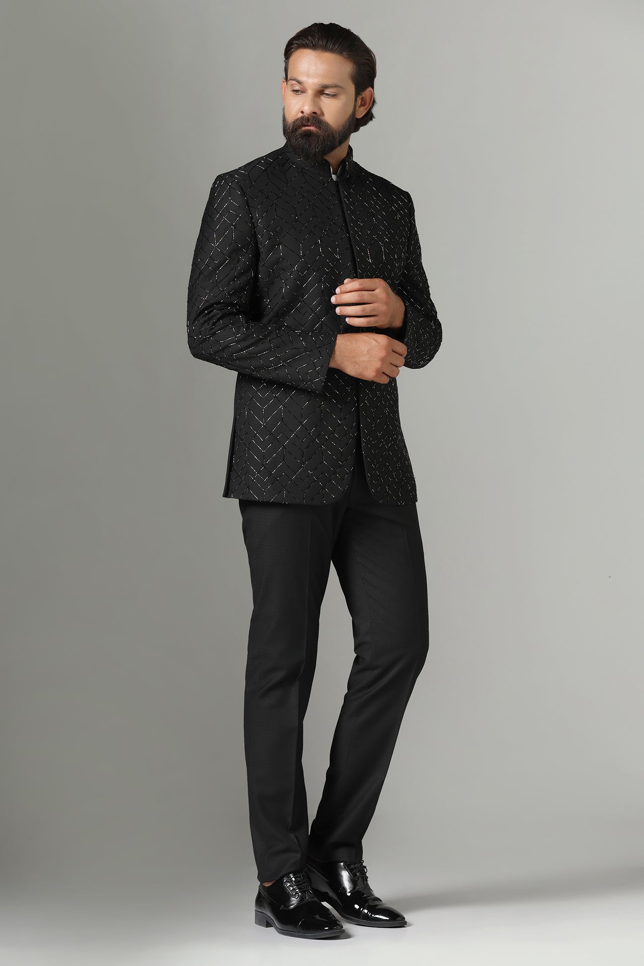 Shop the classic black Bandhgala suit with intricate embroidery for a sophisticated look. Shop now!