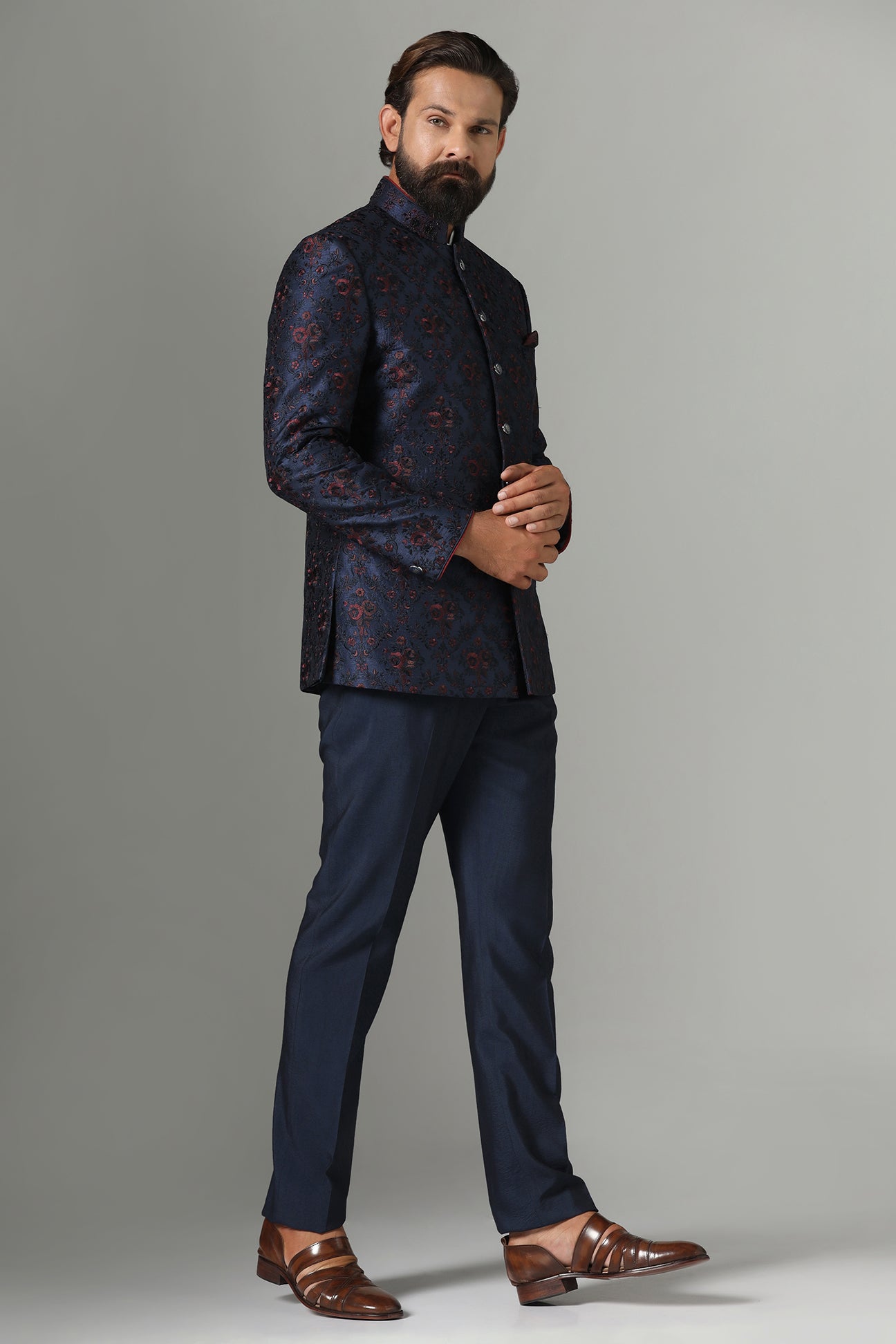 Shop the elegant navy blue Bandhgala suit with exquisite embroidery. Shop now!