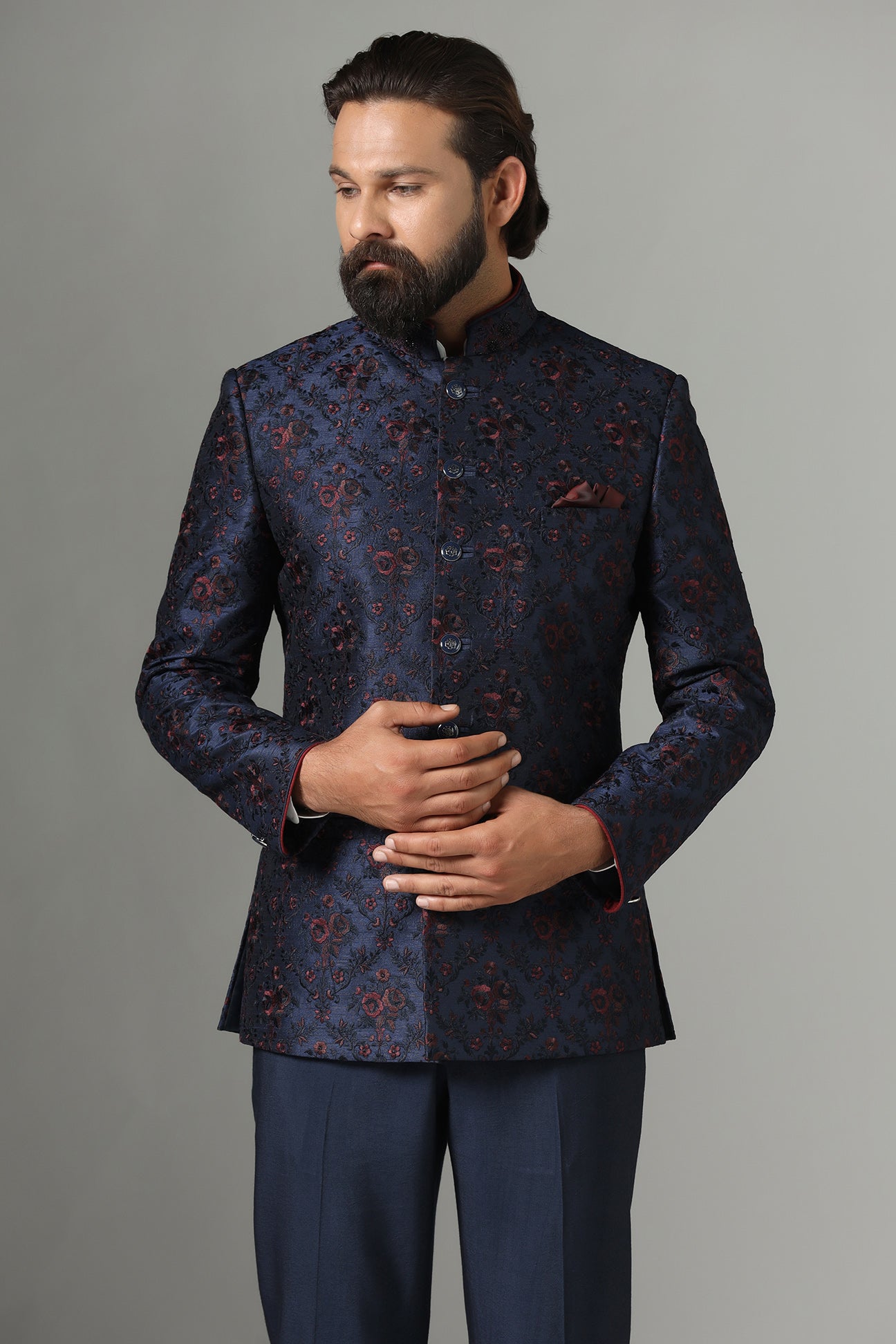 Shop the elegant navy blue Bandhgala suit with exquisite embroidery. Shop now!