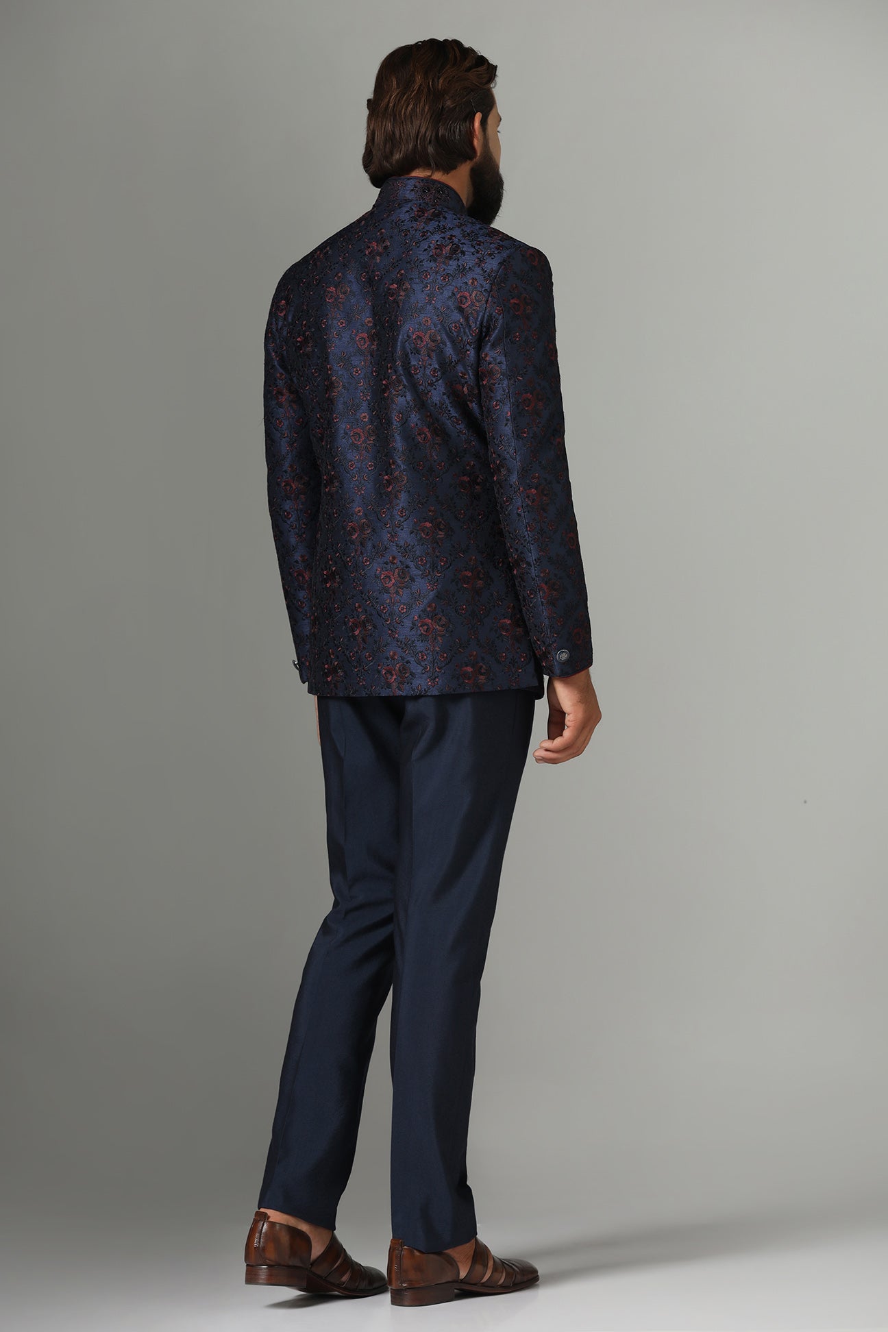 Shop the elegant navy blue Bandhgala suit with exquisite embroidery. Shop now!