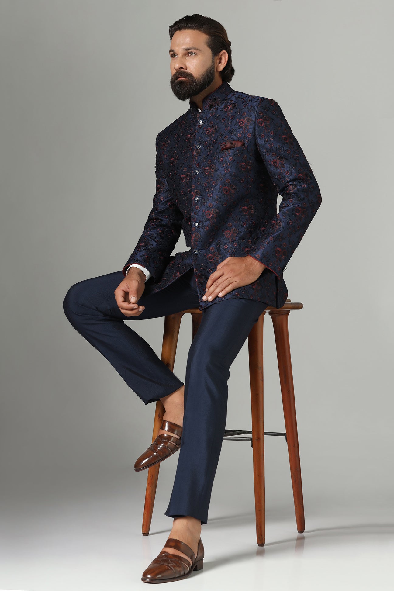 Shop the elegant navy blue Bandhgala suit with exquisite embroidery. Shop now!