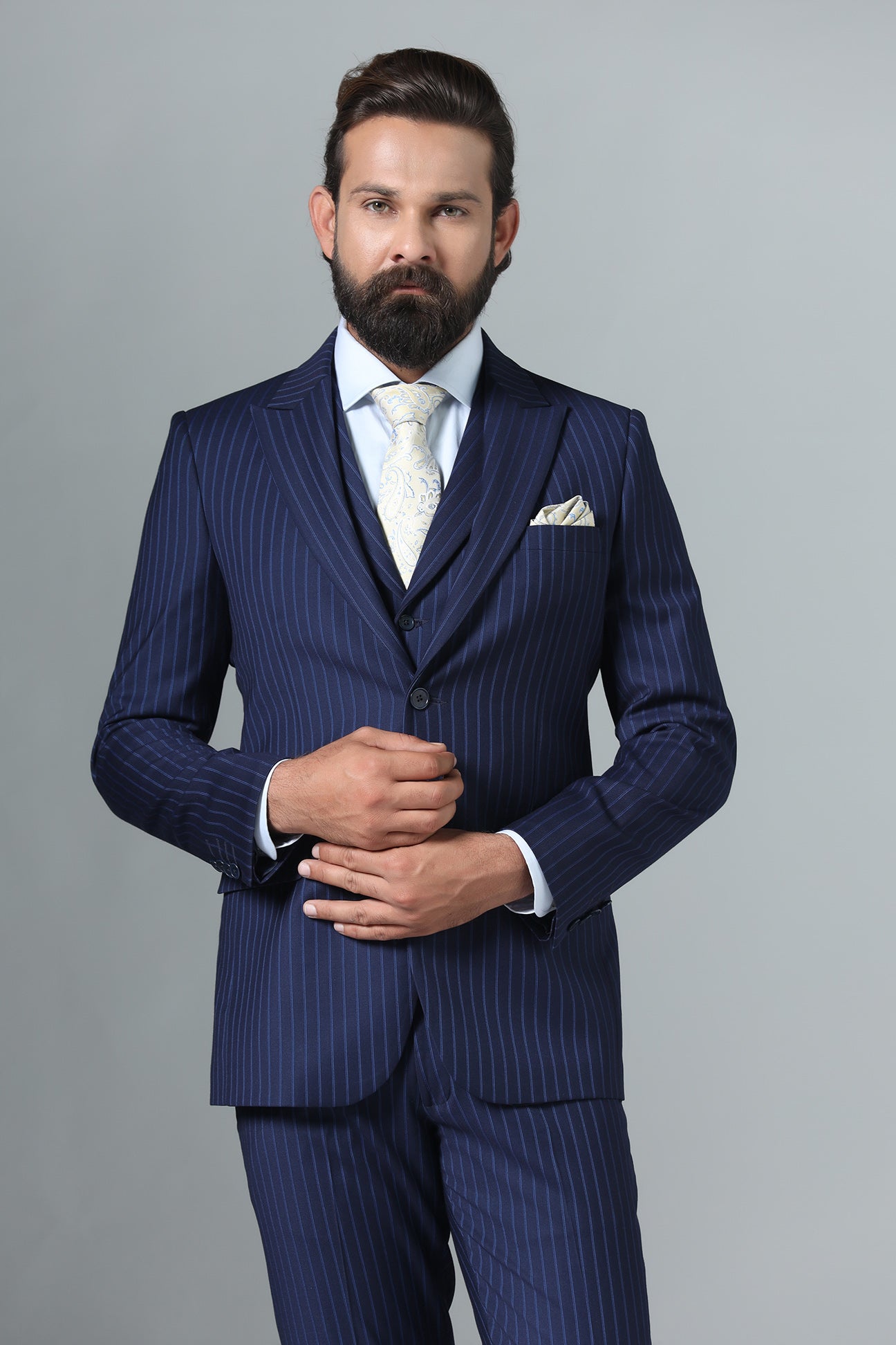 Distinguish your look with our Navy Blue Pinstripe Suit. Shop Now!