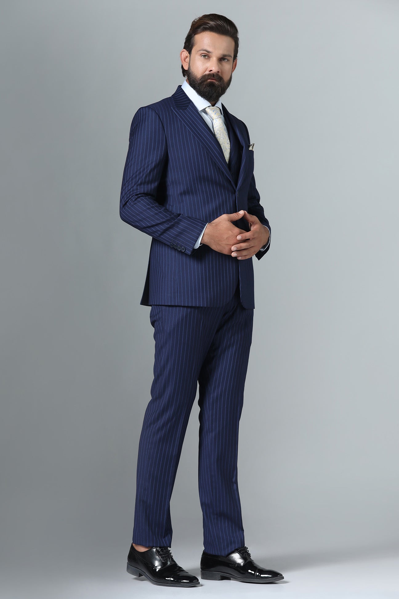 Distinguish your look with our Navy Blue Pinstripe Suit. Shop Now!