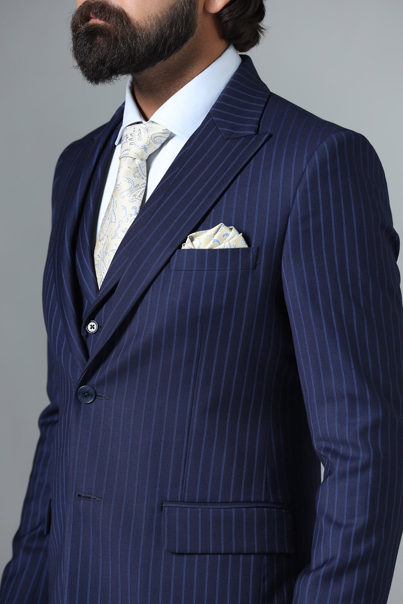 Distinguish your look with our Navy Blue Pinstripe Suit. Shop Now!