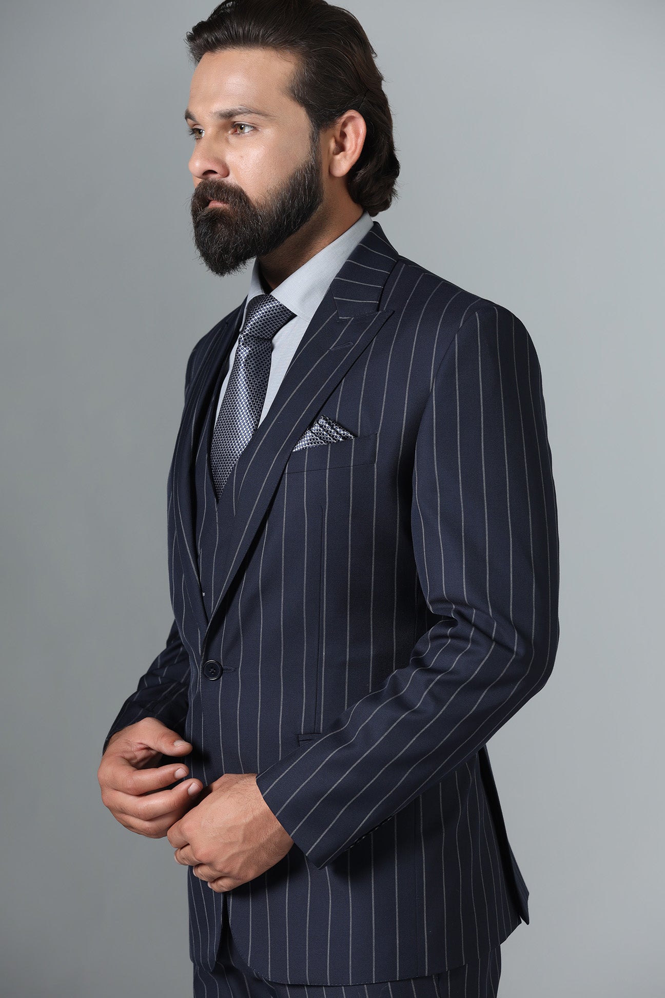 Elevate your formal attire with our Dark Blue Pinstripe Suit. Shop Now!