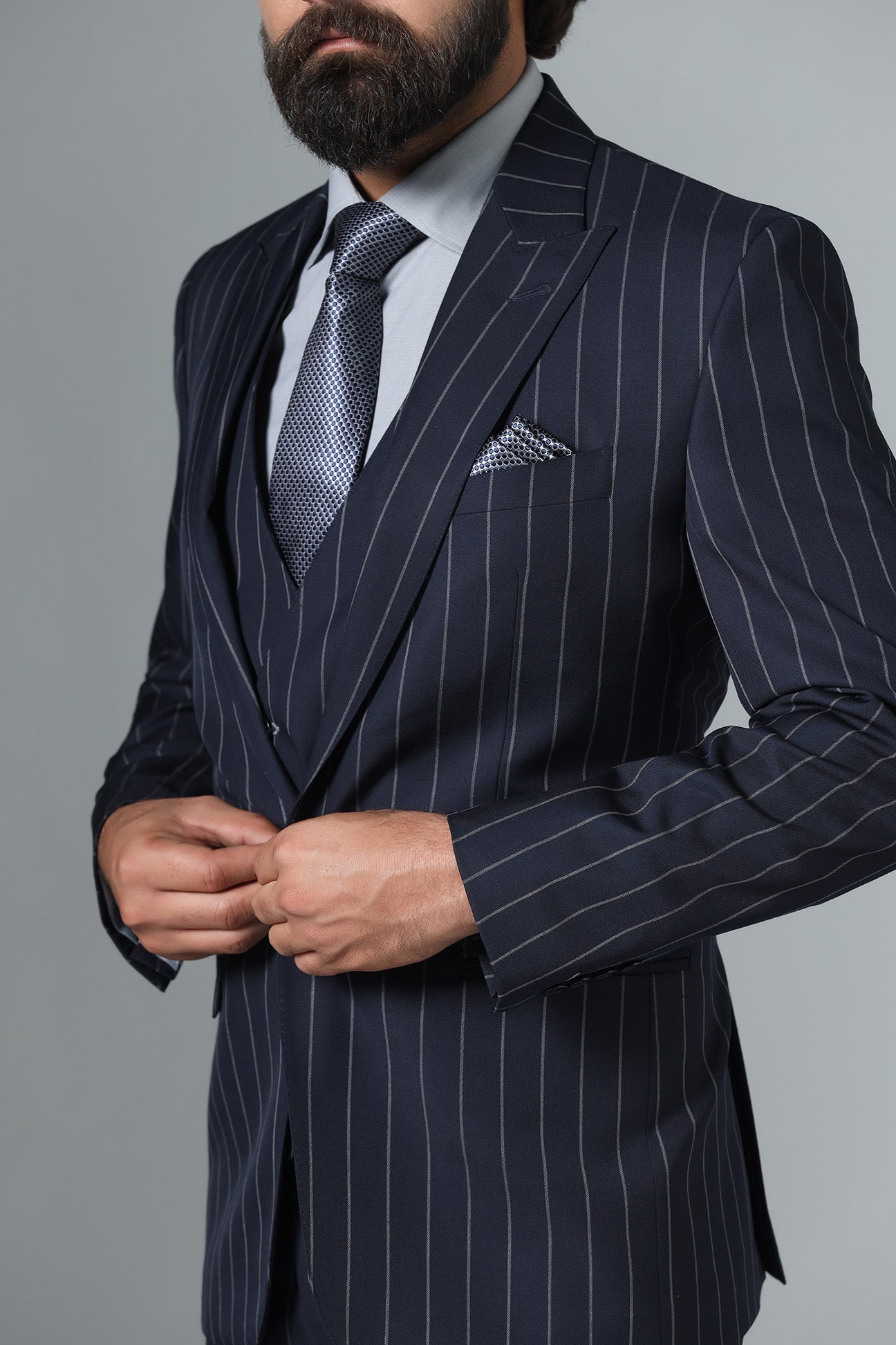 Elevate your formal attire with our Dark Blue Pinstripe Suit. Shop Now!