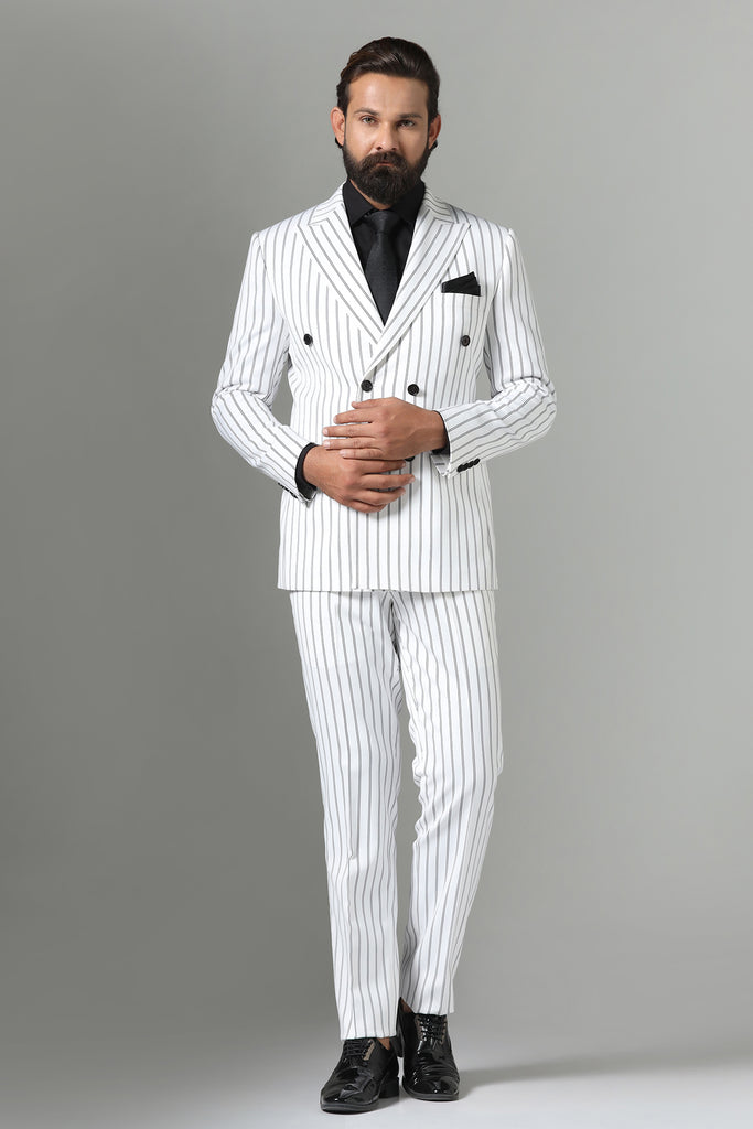 Make a statement in our bold White double-breasted suit. Striking pin-stripe fabric, 2-button closure, peak lapels. Crafted from luxurious wool-rich fabric