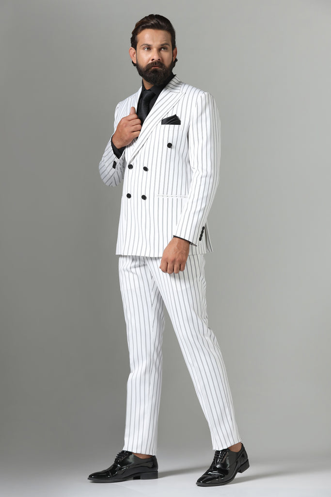 Make a statement in our bold White double-breasted suit. Striking pin-stripe fabric, 2-button closure, peak lapels. Crafted from luxurious wool-rich fabric.