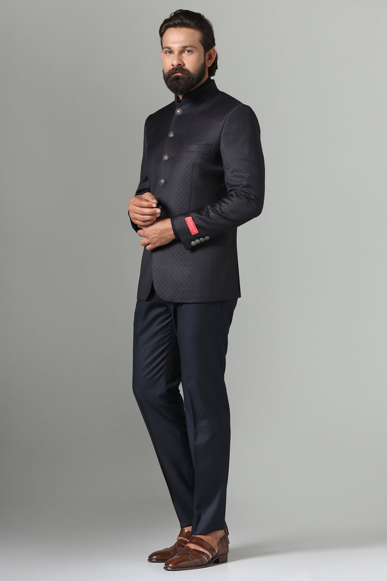 Shop the timeless Bandhgala suit in black for a sleek, elegant look. Shop now!