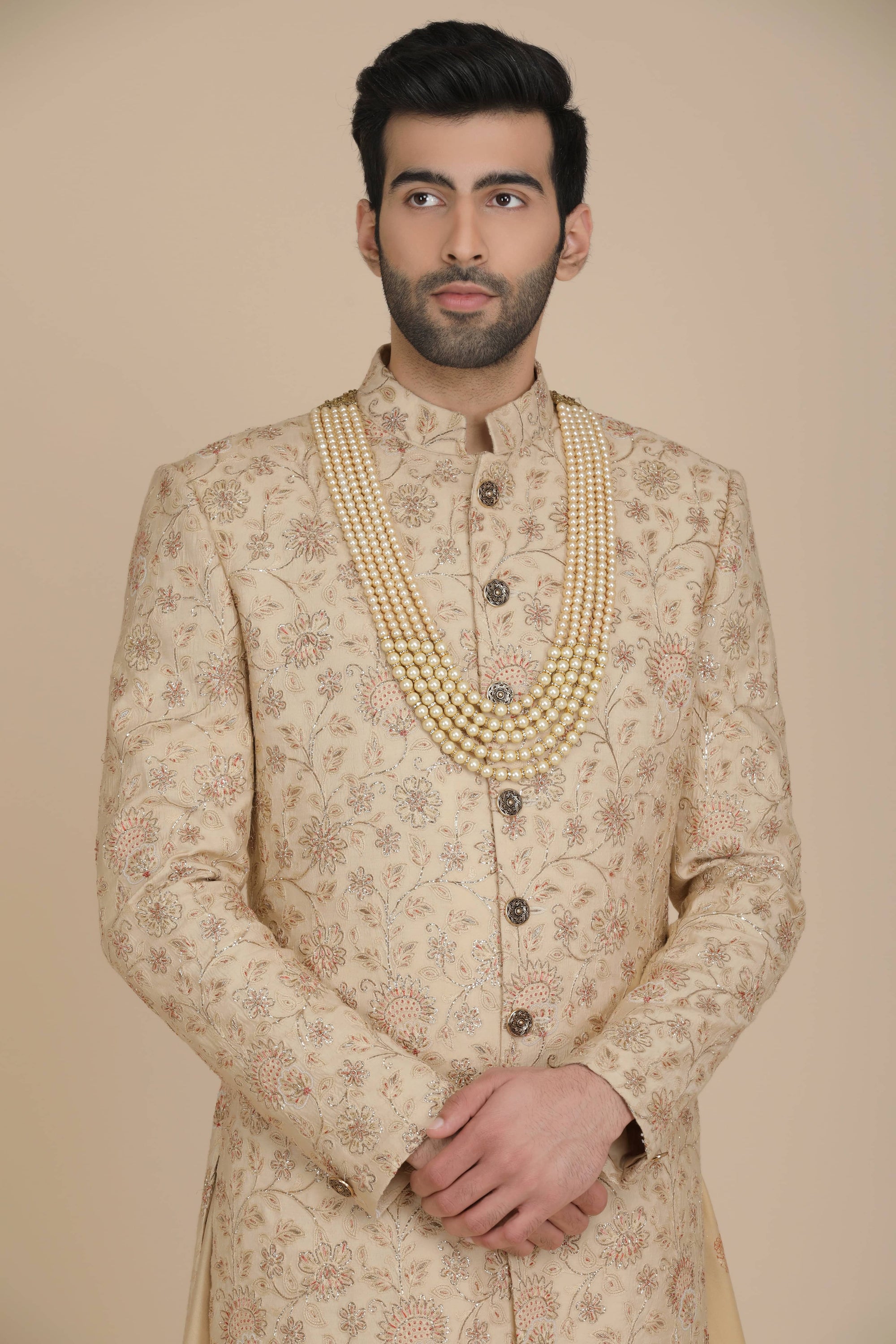 Exquisite floral embroidery adorns this Sherwani. Shop Now!
