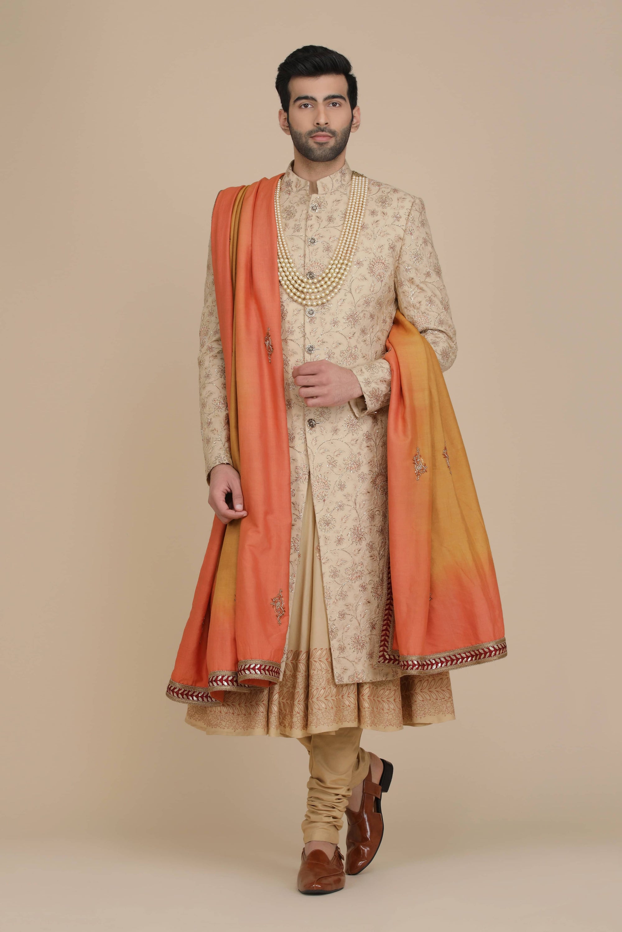 Exquisite floral embroidery adorns this Sherwani. Shop Now!