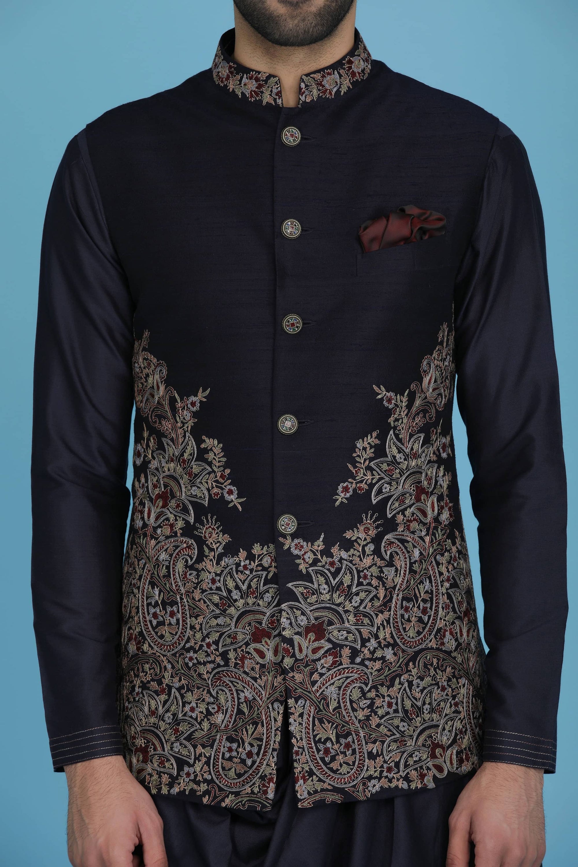 Exude regal charm in our Nehru jacket, adorned with intricate golden zari embroidery. Shop Now!