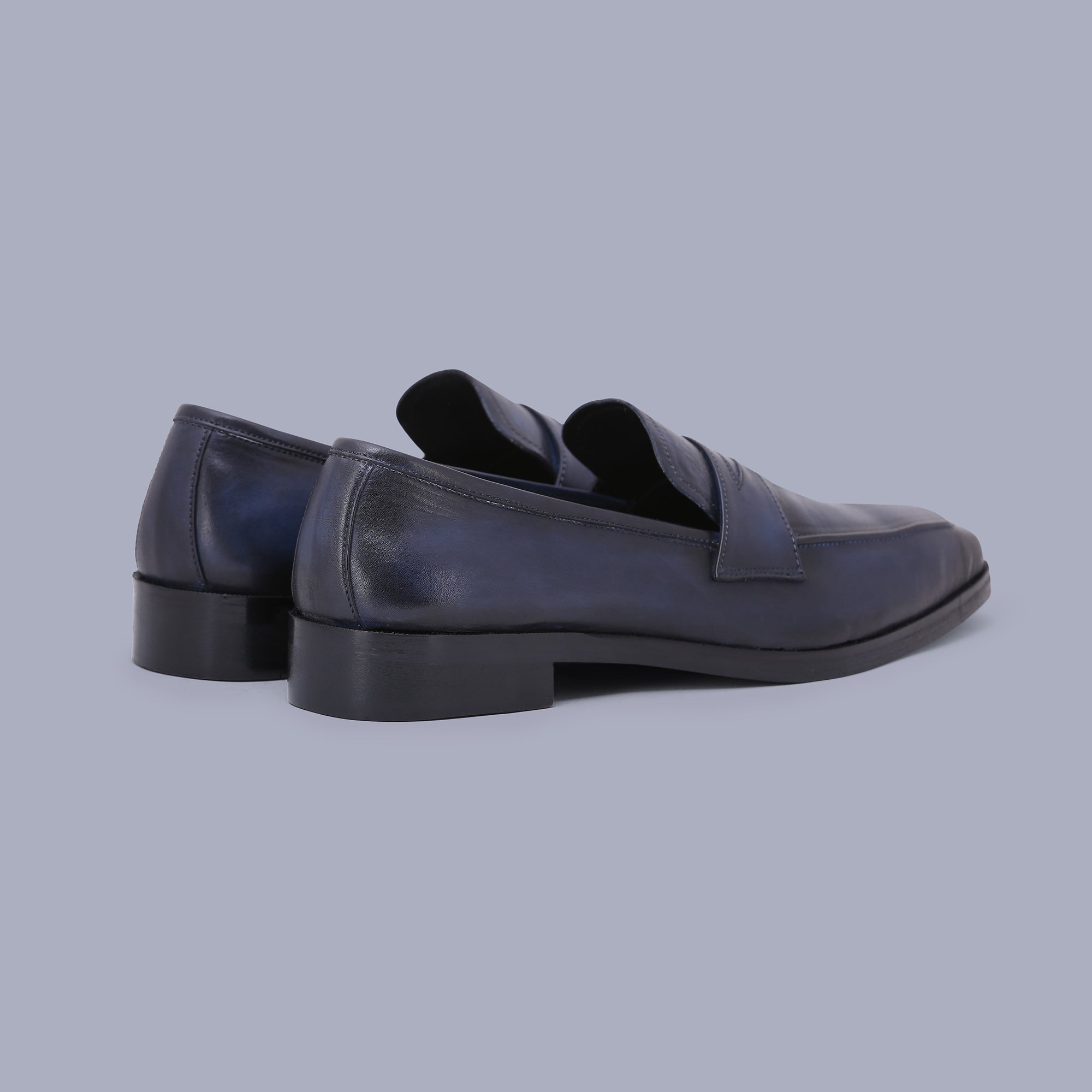 Sleek navy blue loafers redefine shoes for men with elegance and comfort. Shop Now!