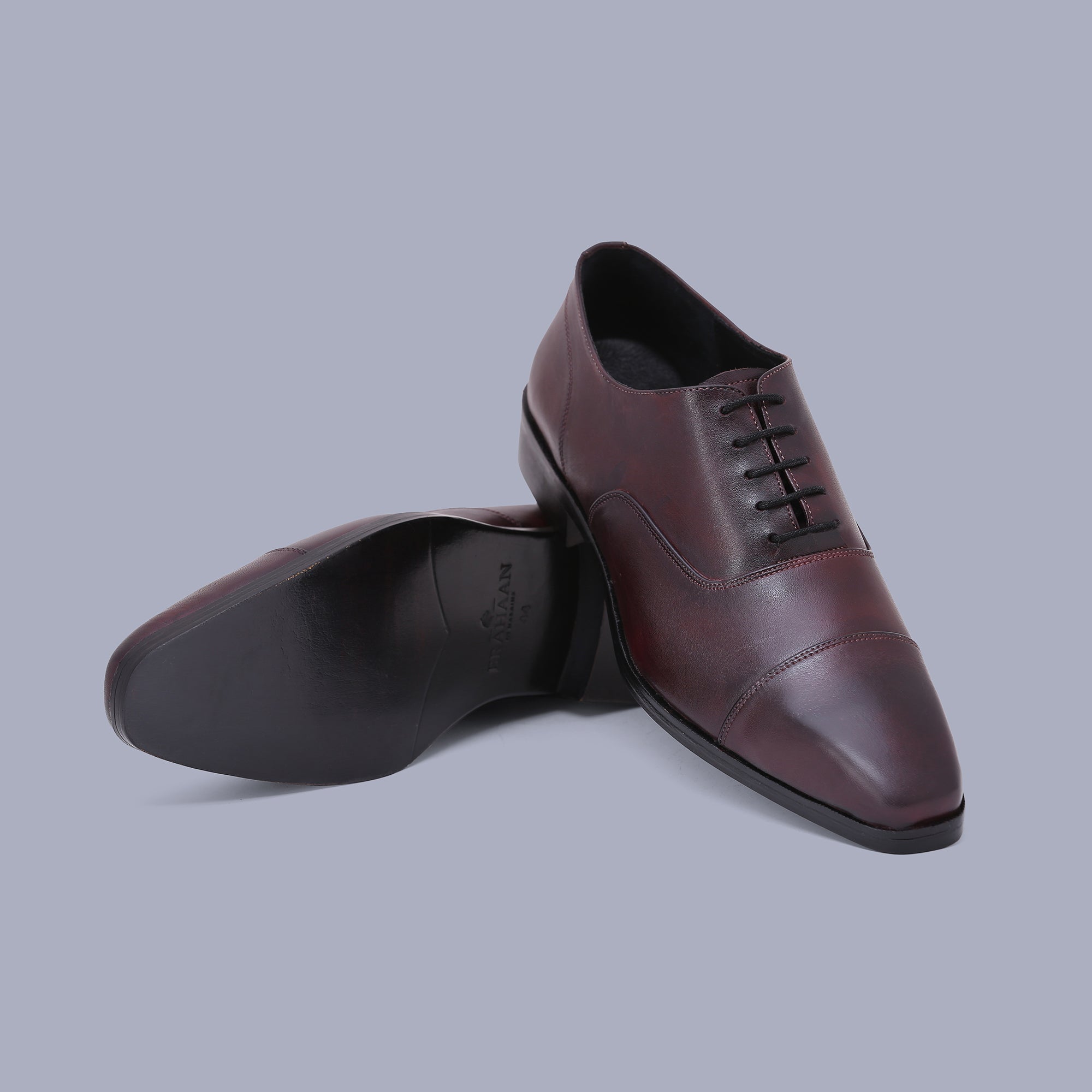Burgundy Oxfords offer timeless charm, making them the finest shoes for men. Shop Now!