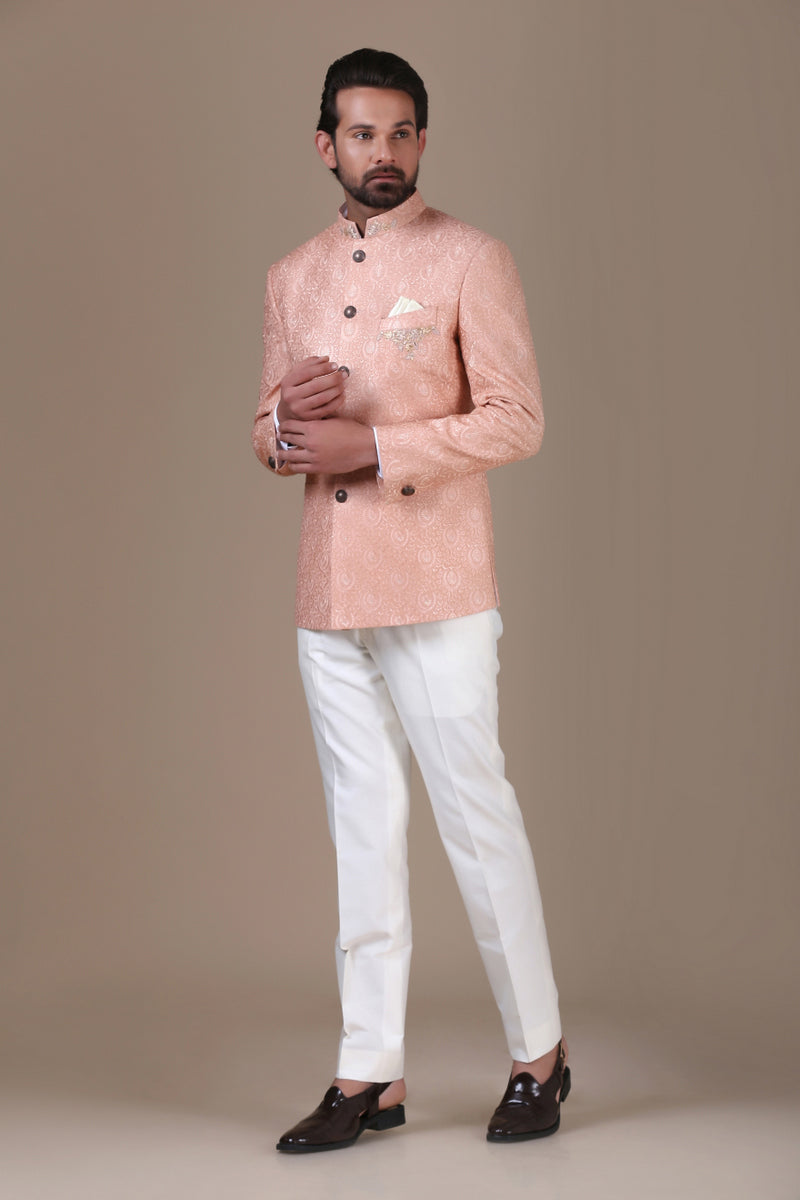 Add grace to your wardrobe with the peach embroidered bandhgala suit. Shop Now!
