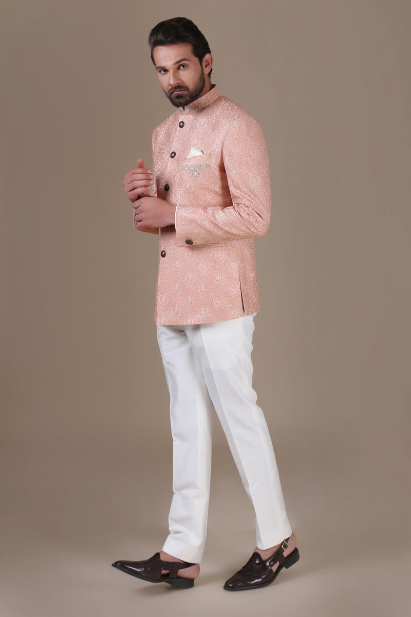 Add grace to your wardrobe with the peach embroidered bandhgala suit. Shop Now!