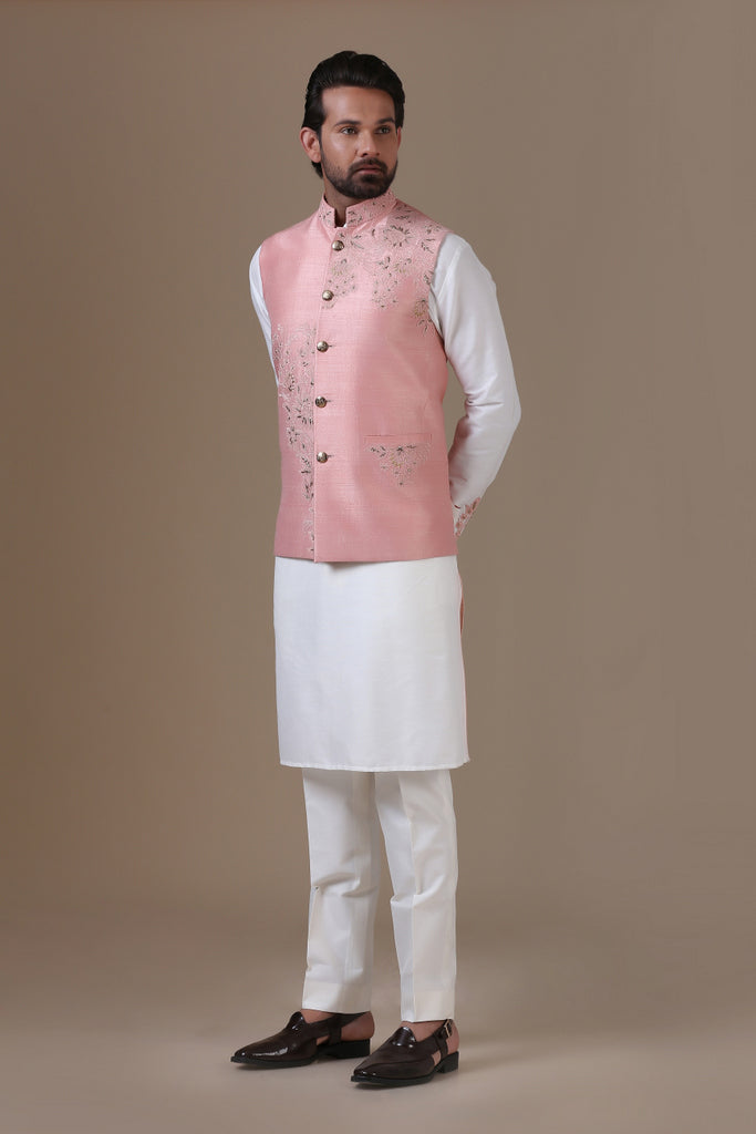 Elevate your style with our Raw Silk Nehru Coat paired with Cotton Trousers, blending sophistication with comfort seamlessly.