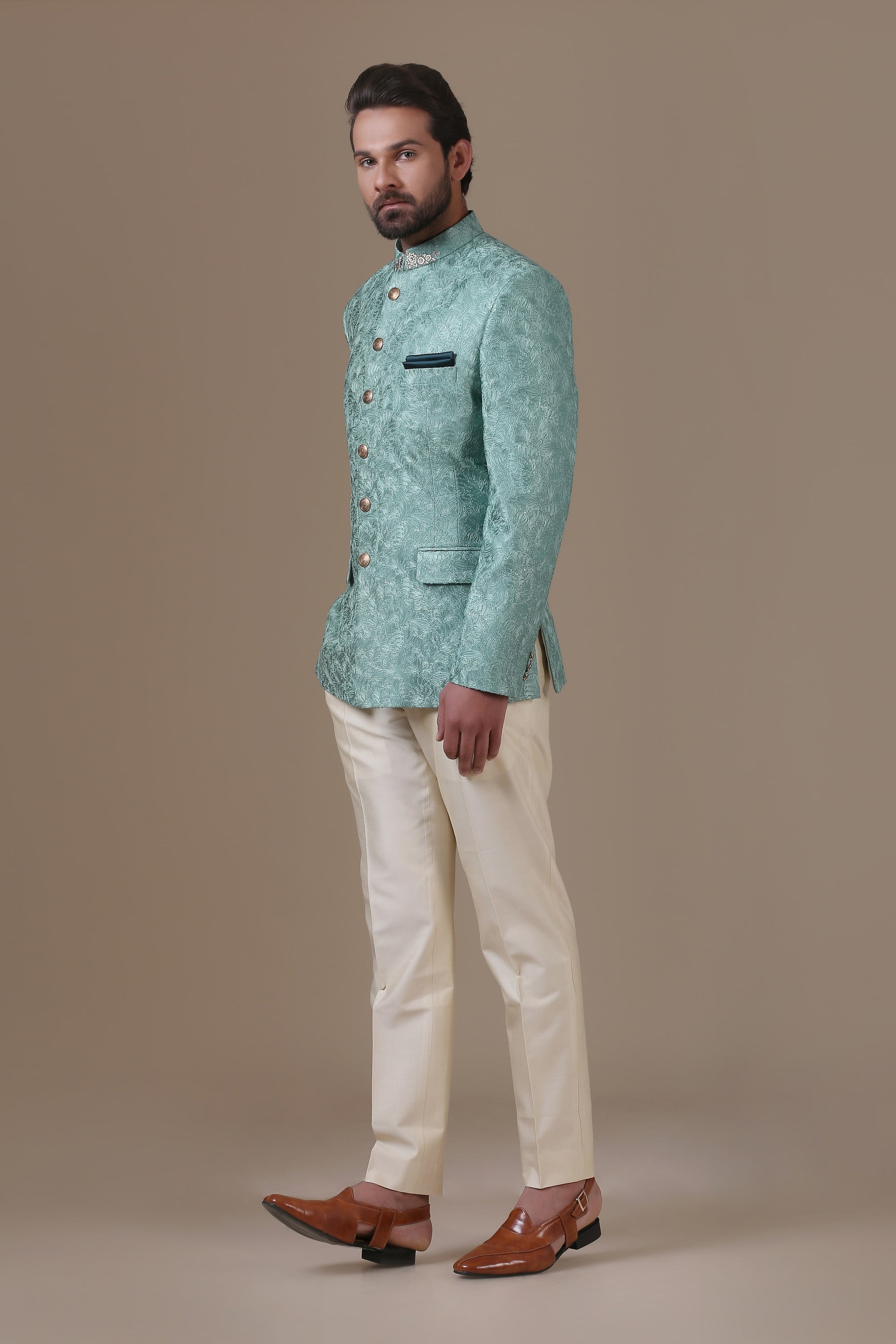 Elevate your style with the mint green embroidered Bandhgala suit. Shop now!