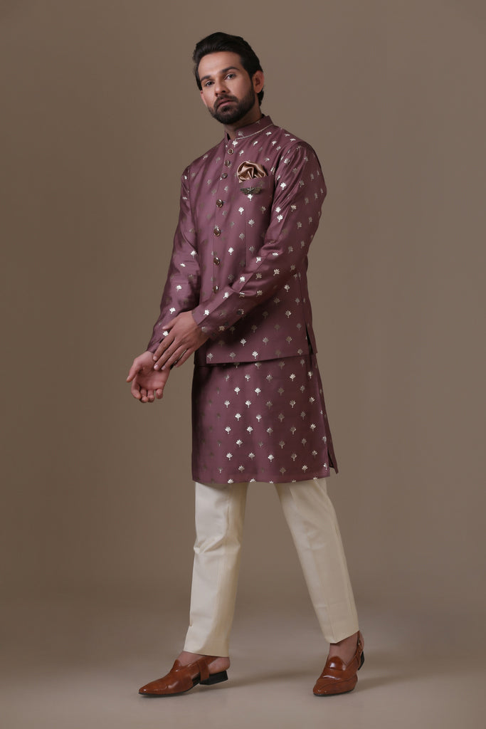 Crafted in luxurious raw silk fabric, our Nehru coat pairs with cotton trousers. Shop Now!