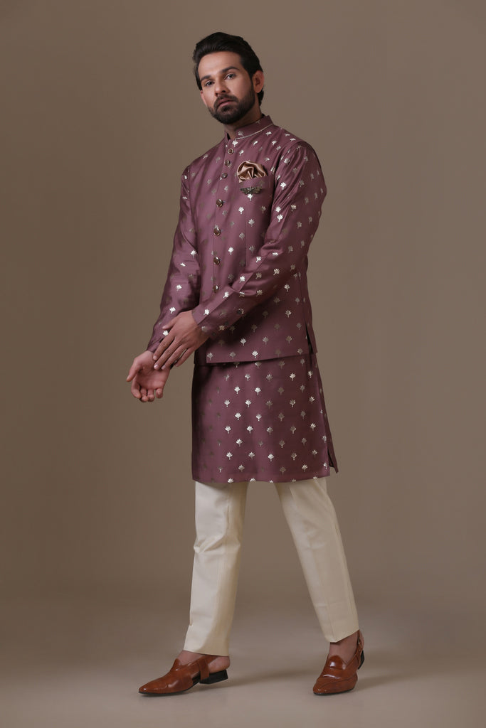 Crafted in luxurious raw silk fabric, our Nehru coat pairs effortlessly with cotton trousers for a blend of sophistication and comfort.
