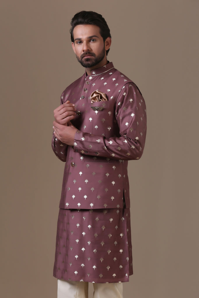 Crafted in luxurious raw silk fabric, our Nehru coat pairs with cotton trousers. Shop Now!