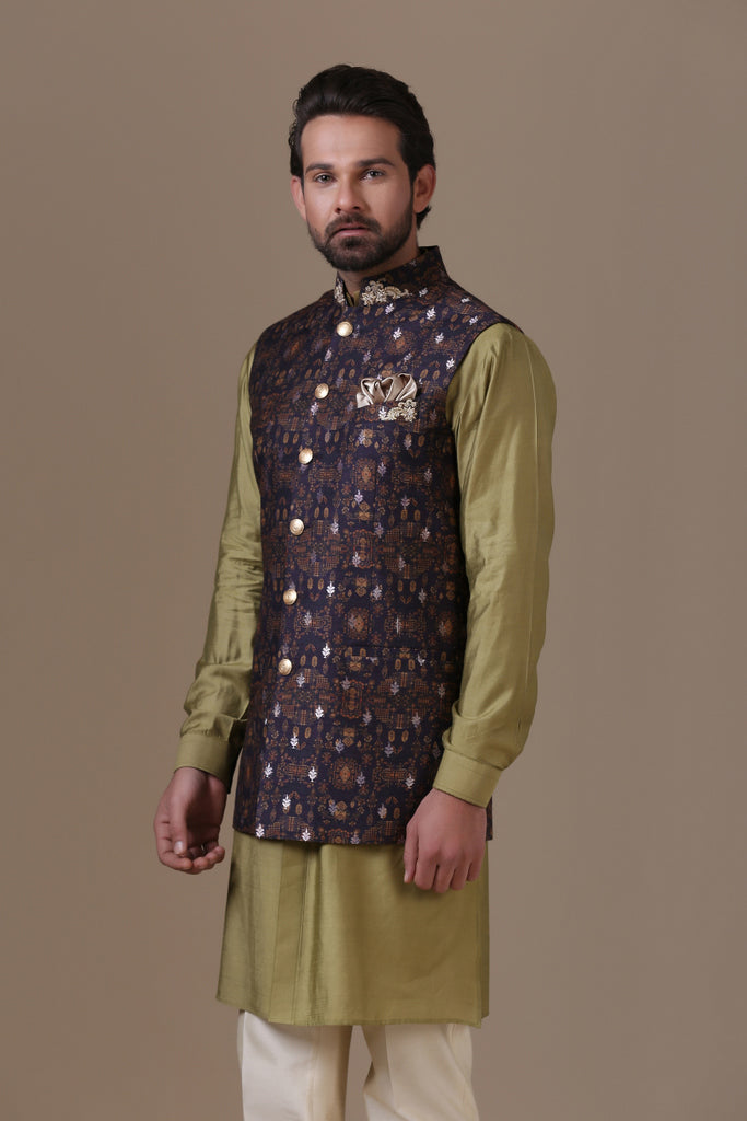 Crafted in luxurious raw silk fabric, our Nehru coat pairs with cotton trousers. Shop Now!