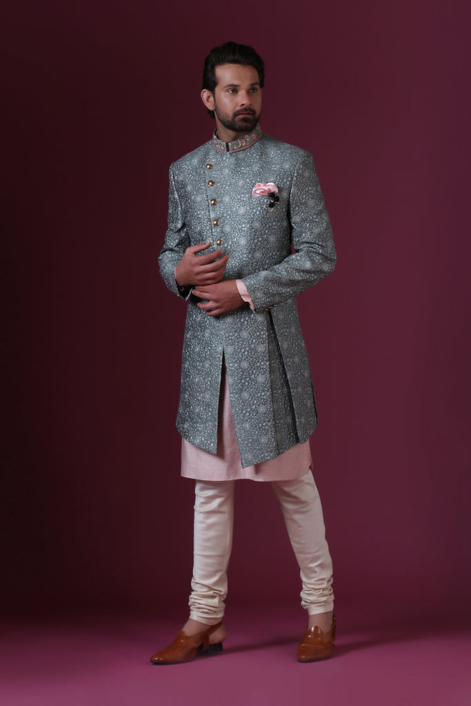 Light Green embroidered Indo-Western with a modern, asymmetric cut. Shop Now!