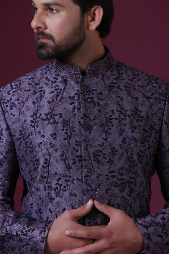 Make a statement with the purple embroidered bandhgala suit.Shop Now!