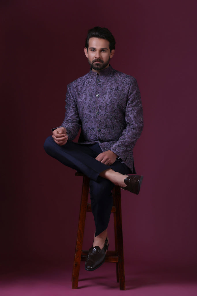 Make a statement with the purple embroidered bandhgala suit.Shop Now!