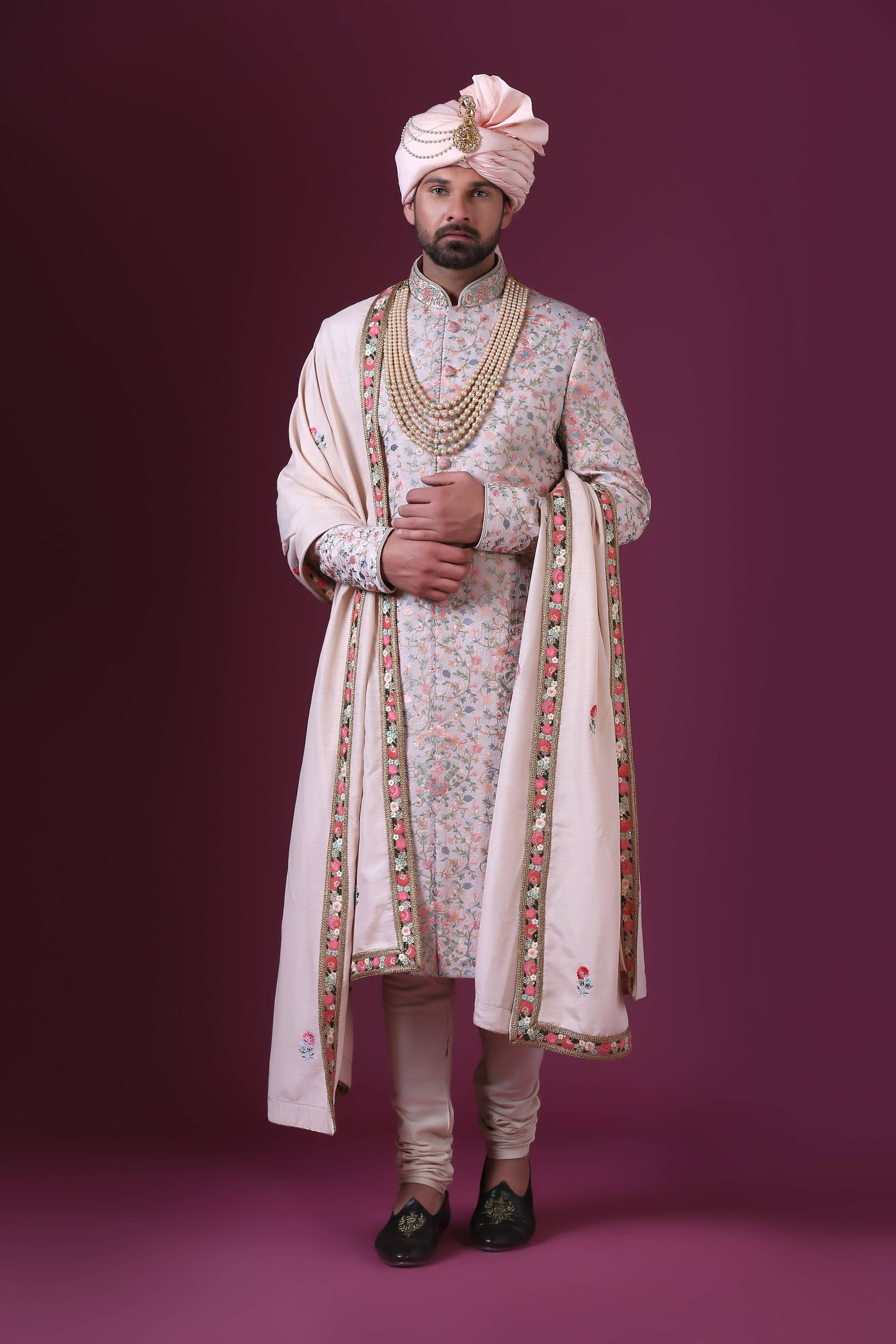 Charm in white with multicolor floral embroidery, exuding soft pastel elegance. Shop Now!