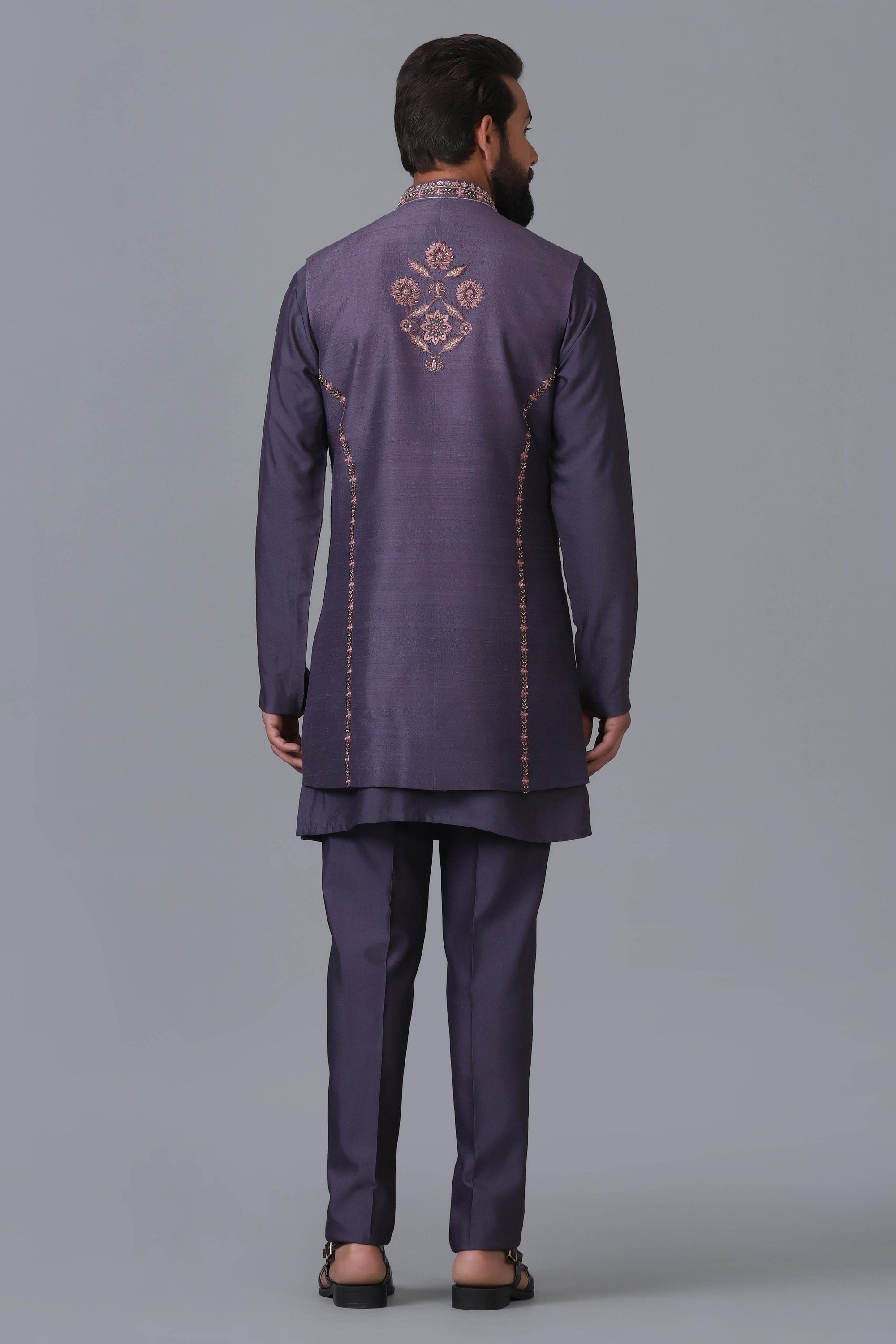 Elevate your ensemble with our long purple raw silk Nehru jacket. Shop Now!
