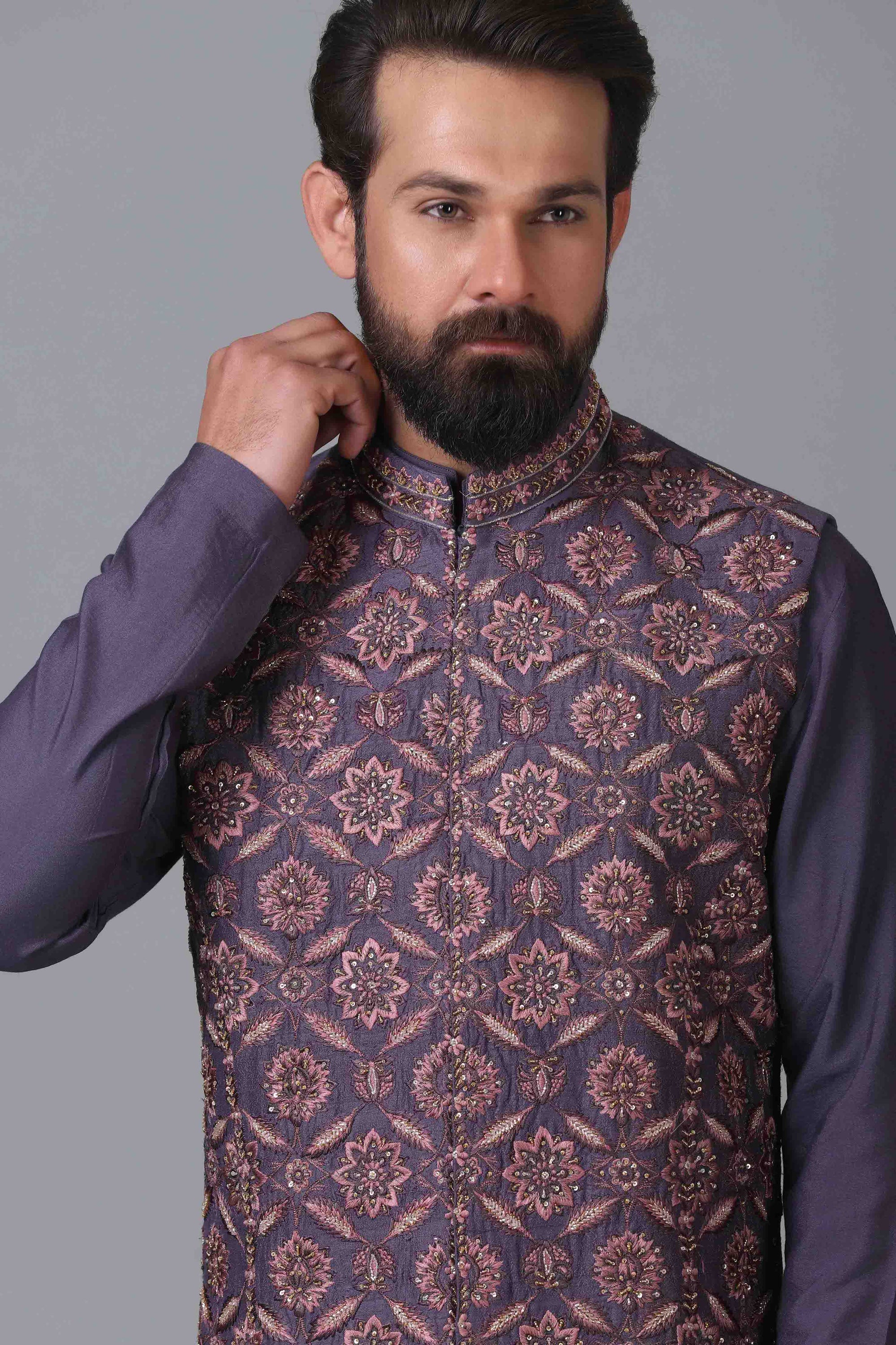 Elevate your ensemble with our long purple raw silk Nehru jacket. Shop Now!