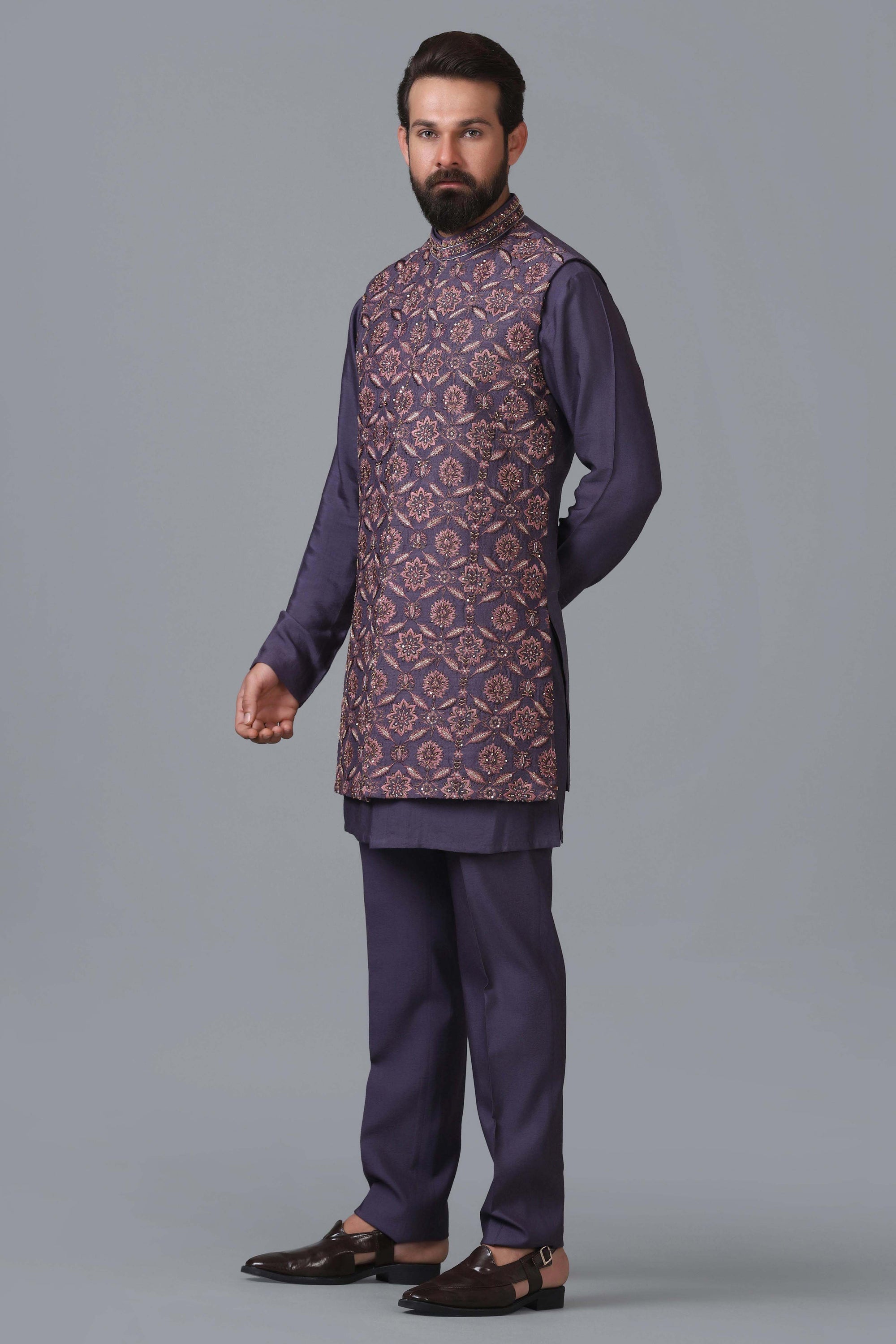 Elevate your ensemble with our long purple raw silk Nehru jacket. Shop Now!