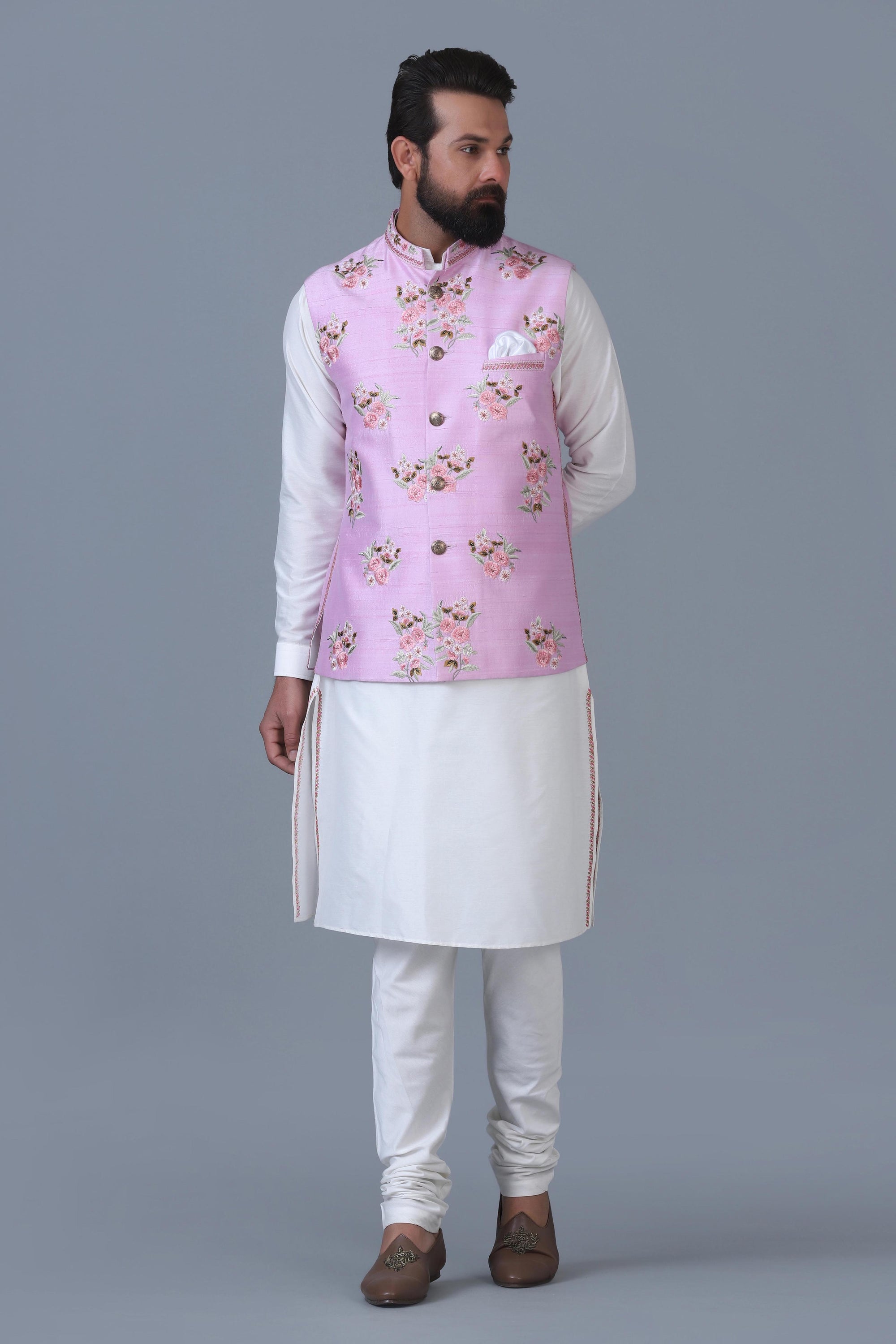 Elevate your style with our light pink Nehru Jacket, adorned with intricate floral motifs. Shop Now!